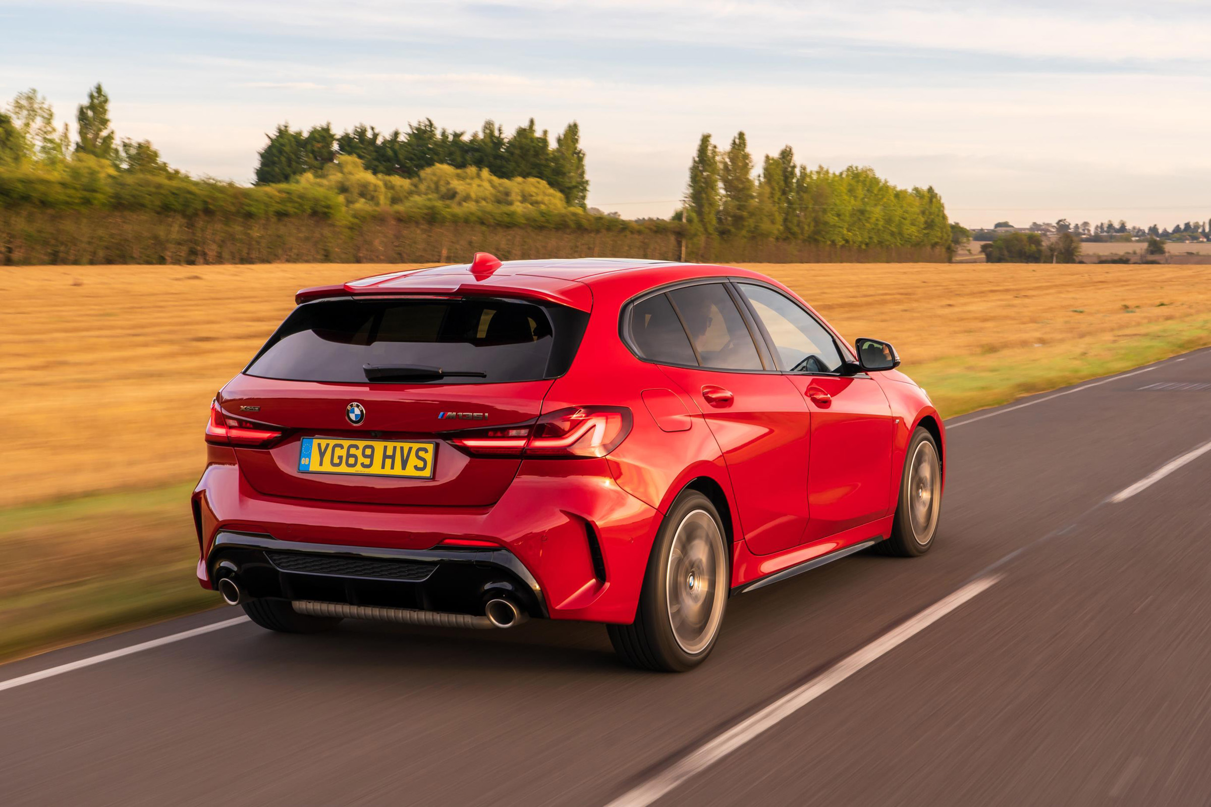 BMW M135i xDrive - dynamic rear 3/4 view