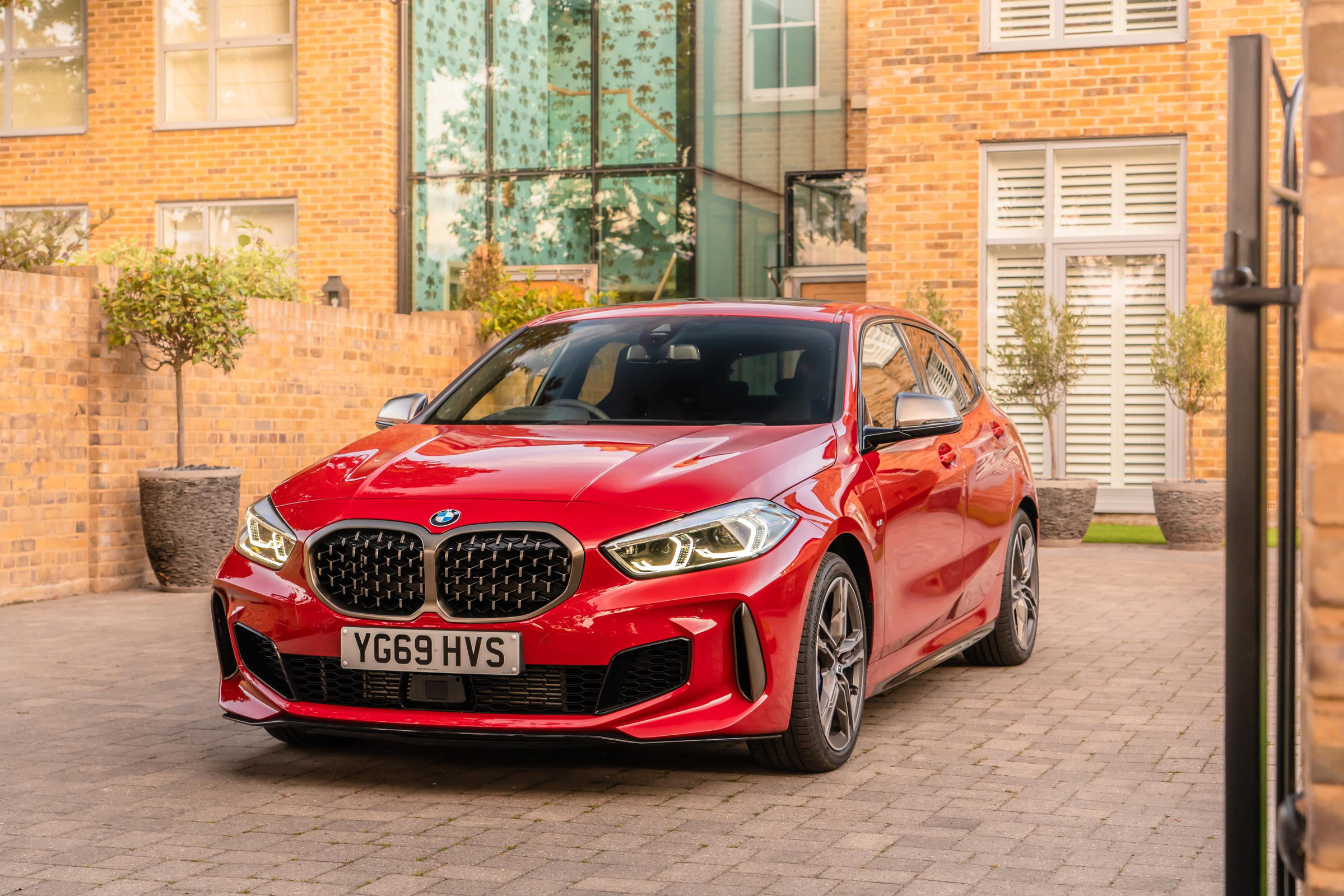 BMW M135i xDrive - static front 3/4 view