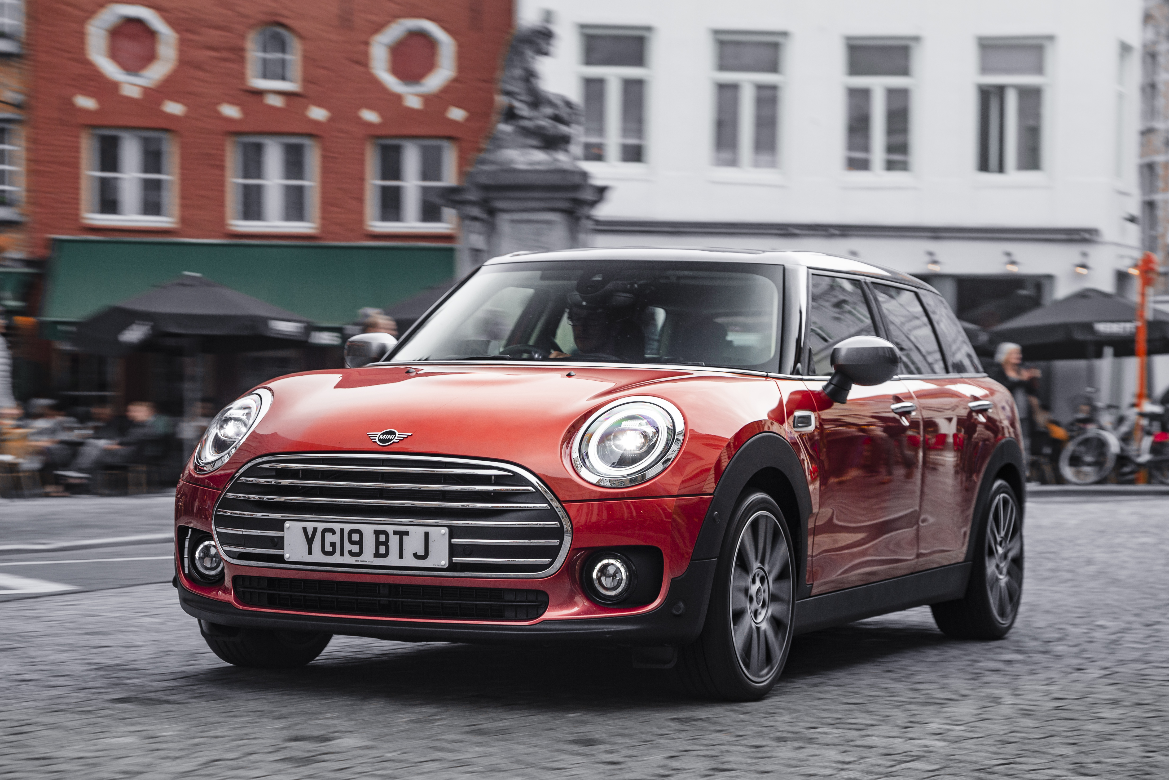 MINI Clubman driving through a town