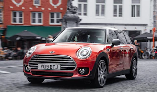 MINI Clubman driving through a town
