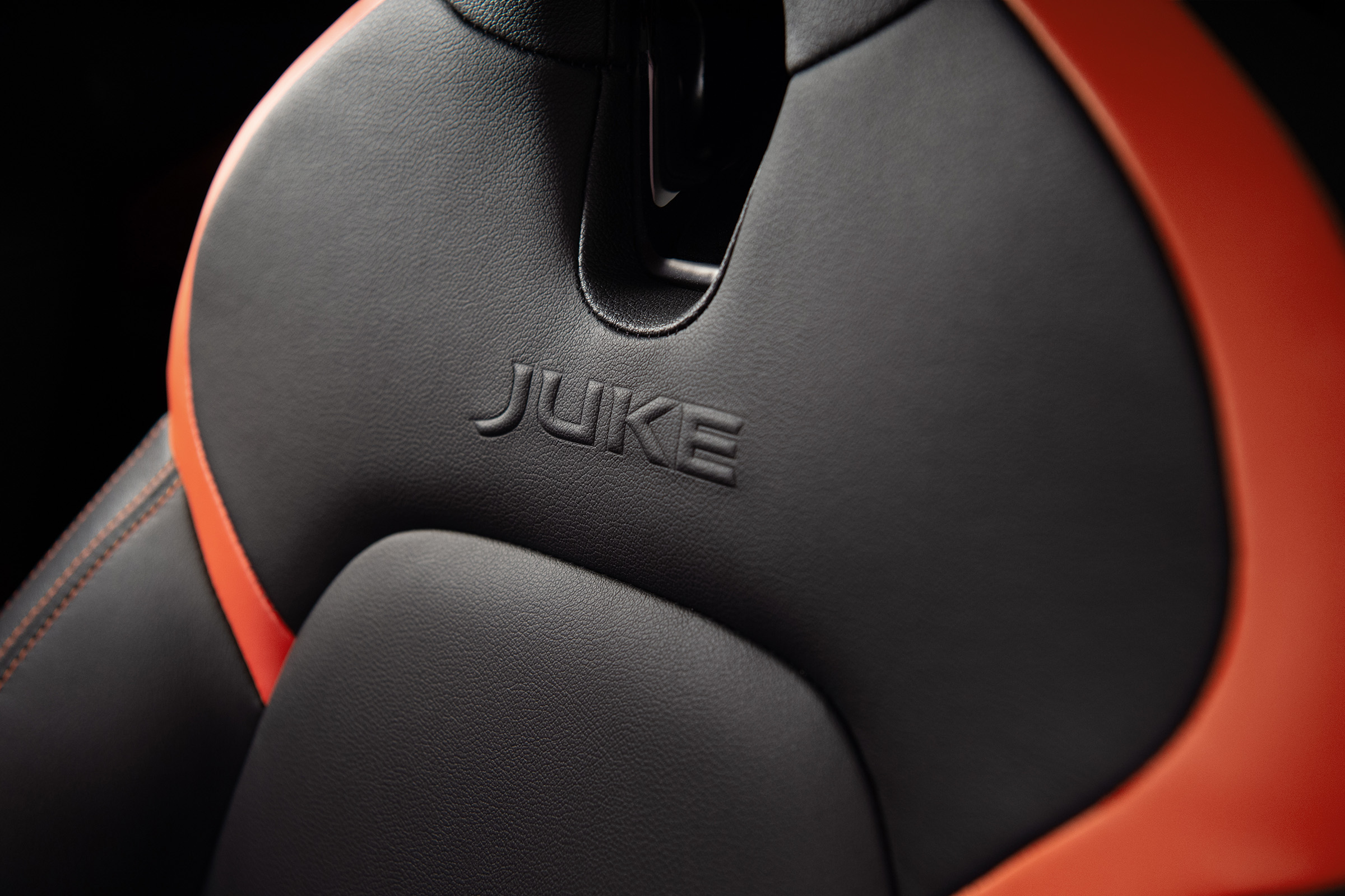 New Nissan Juke seat details in orange and black