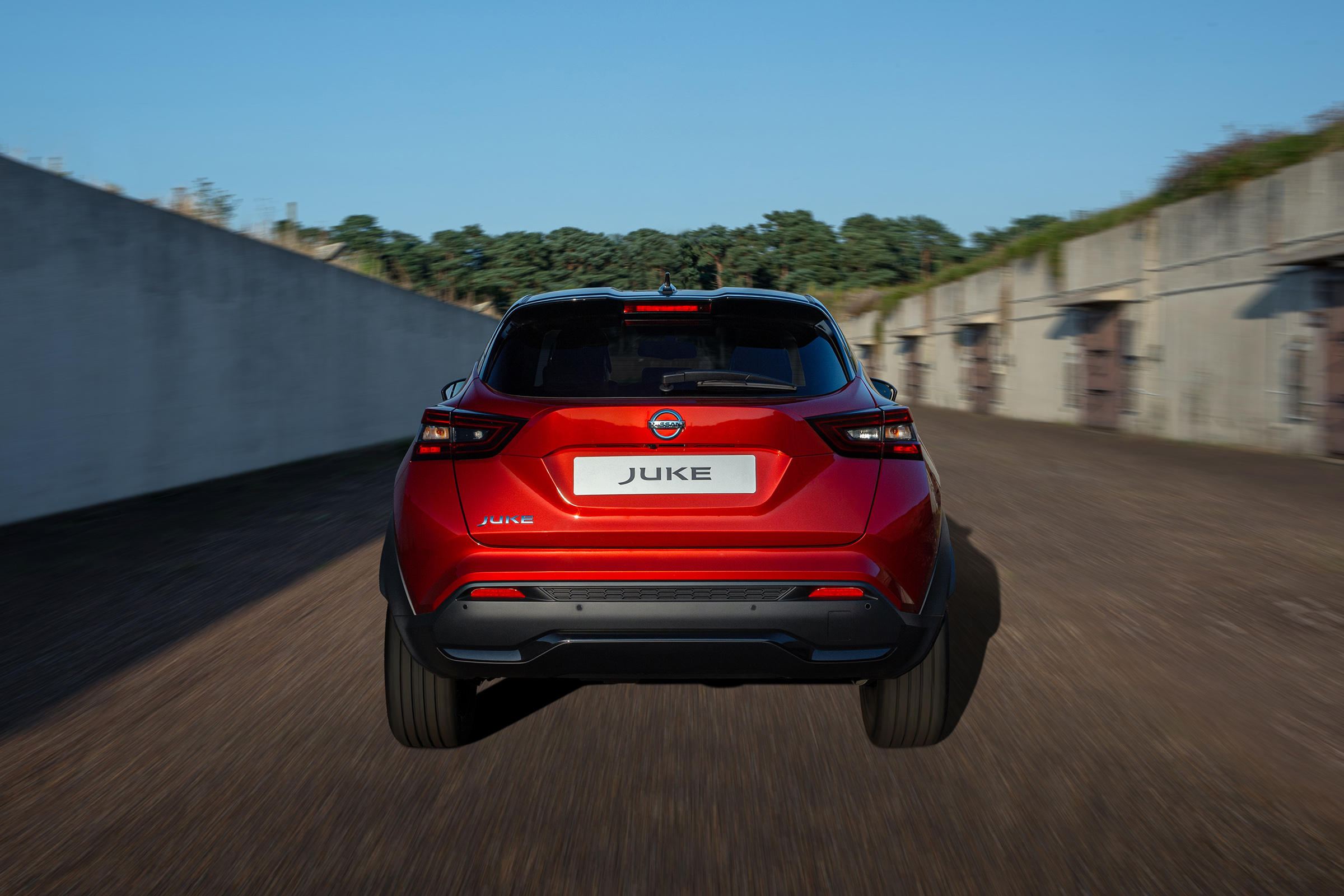 New Nissan Juke driving - rear end view