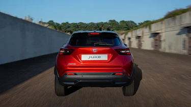 New Nissan Juke driving - rear end view
