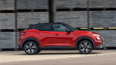 New Nissan Juke driving - side view
