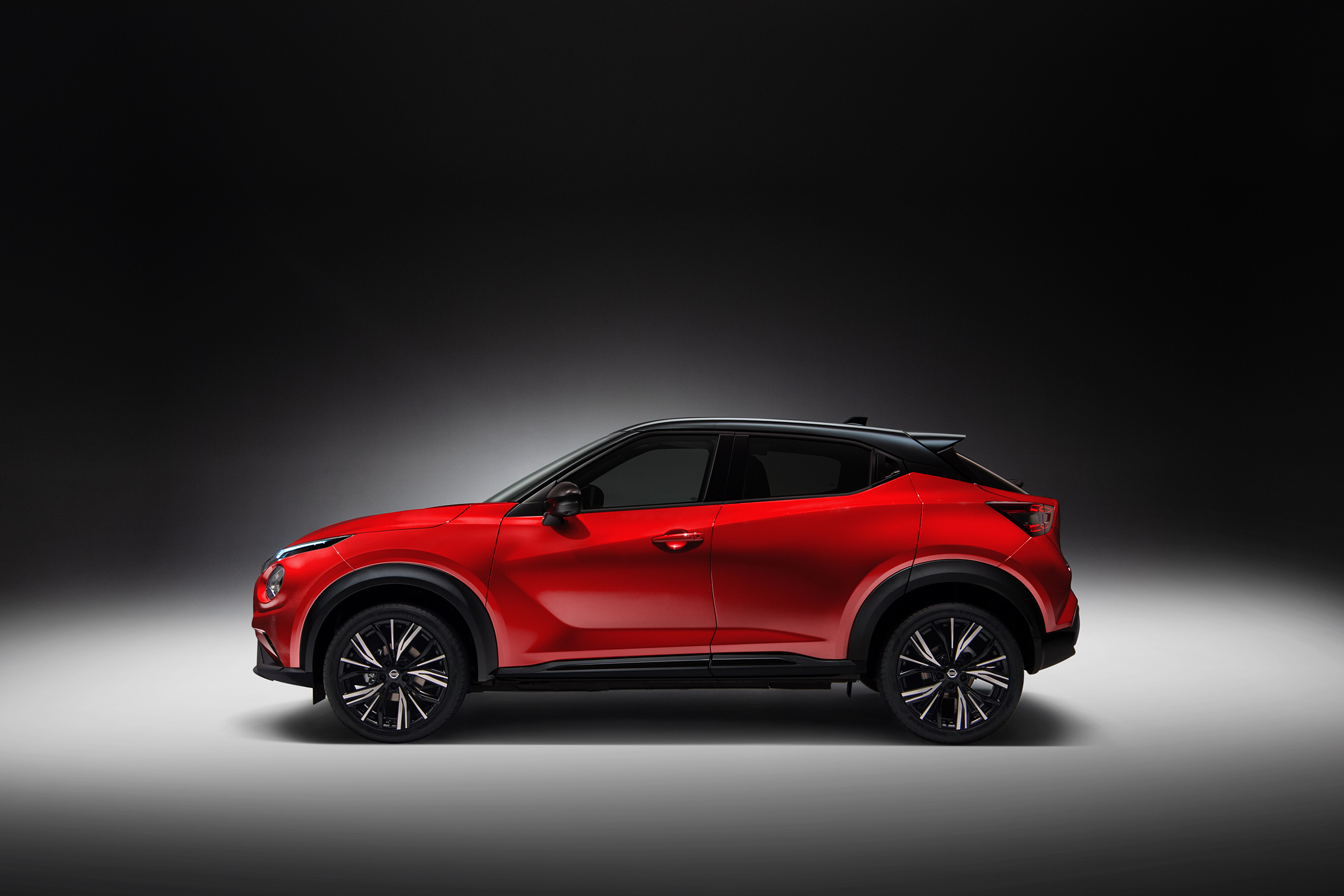 New Nissan Juke in red - side view
