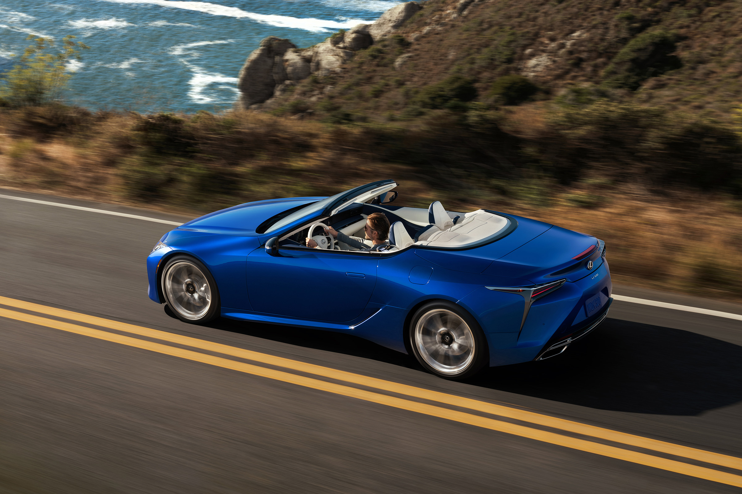 Lexus LC500 Convertible driving - top/side view