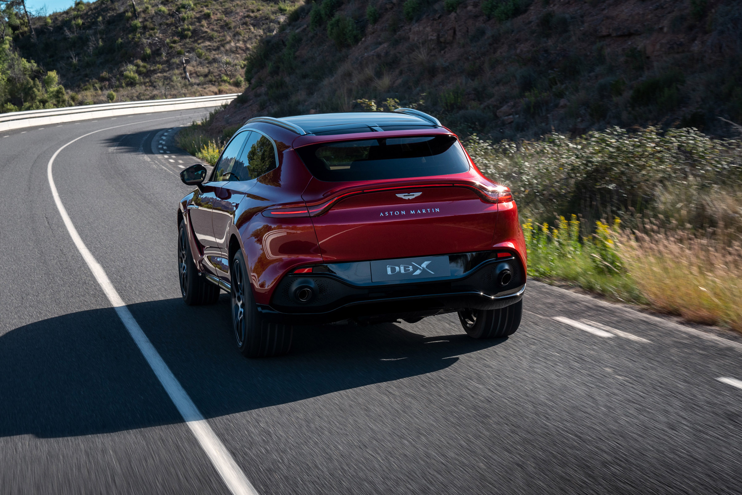 Aston Martin DBX driving - rear view