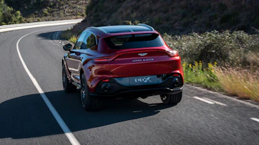 Aston Martin DBX driving - rear view