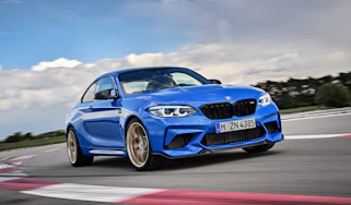 BMW M2 CS driving on racetrack