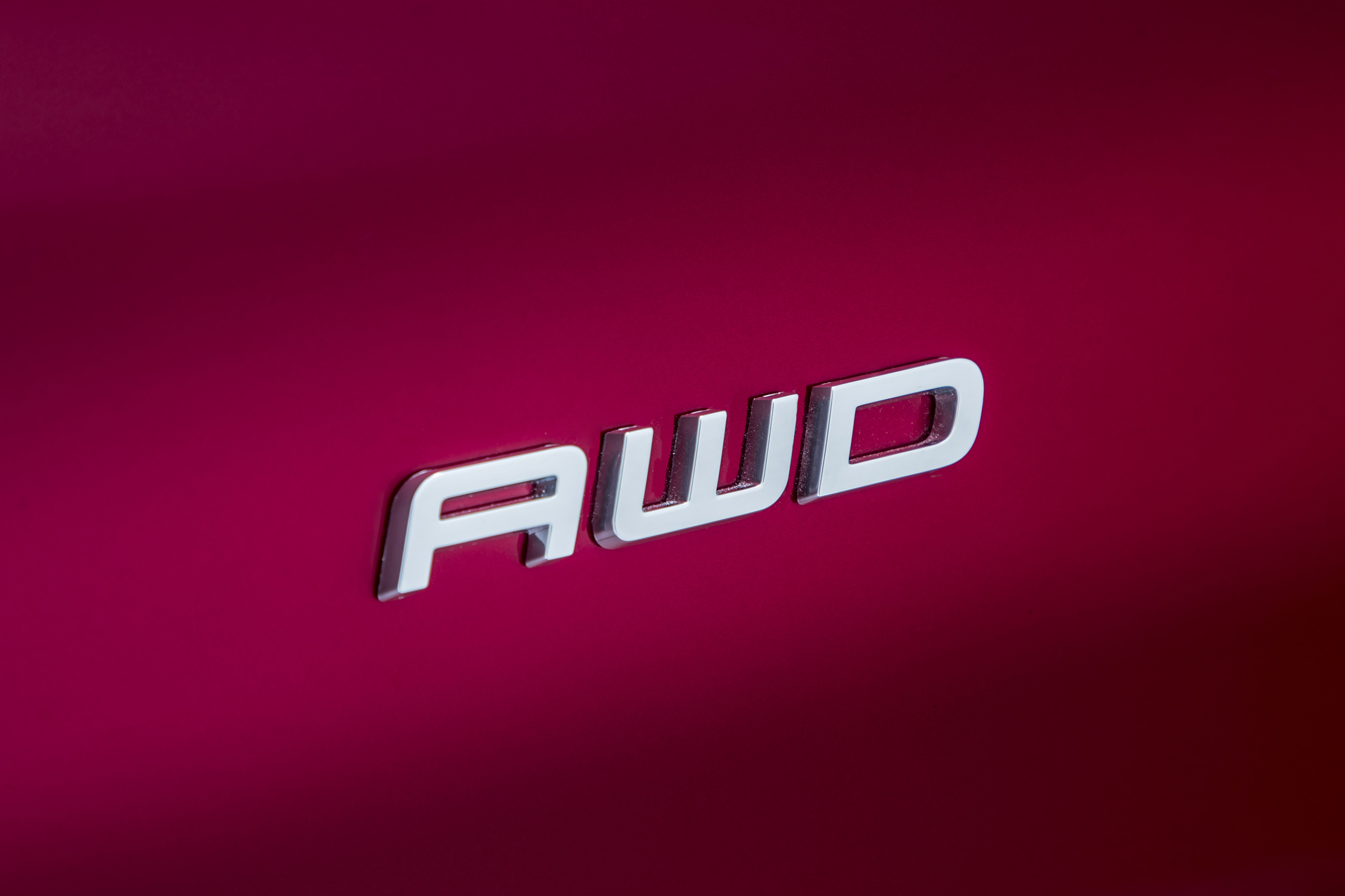 Ford Mustang Mach-E AWD badge