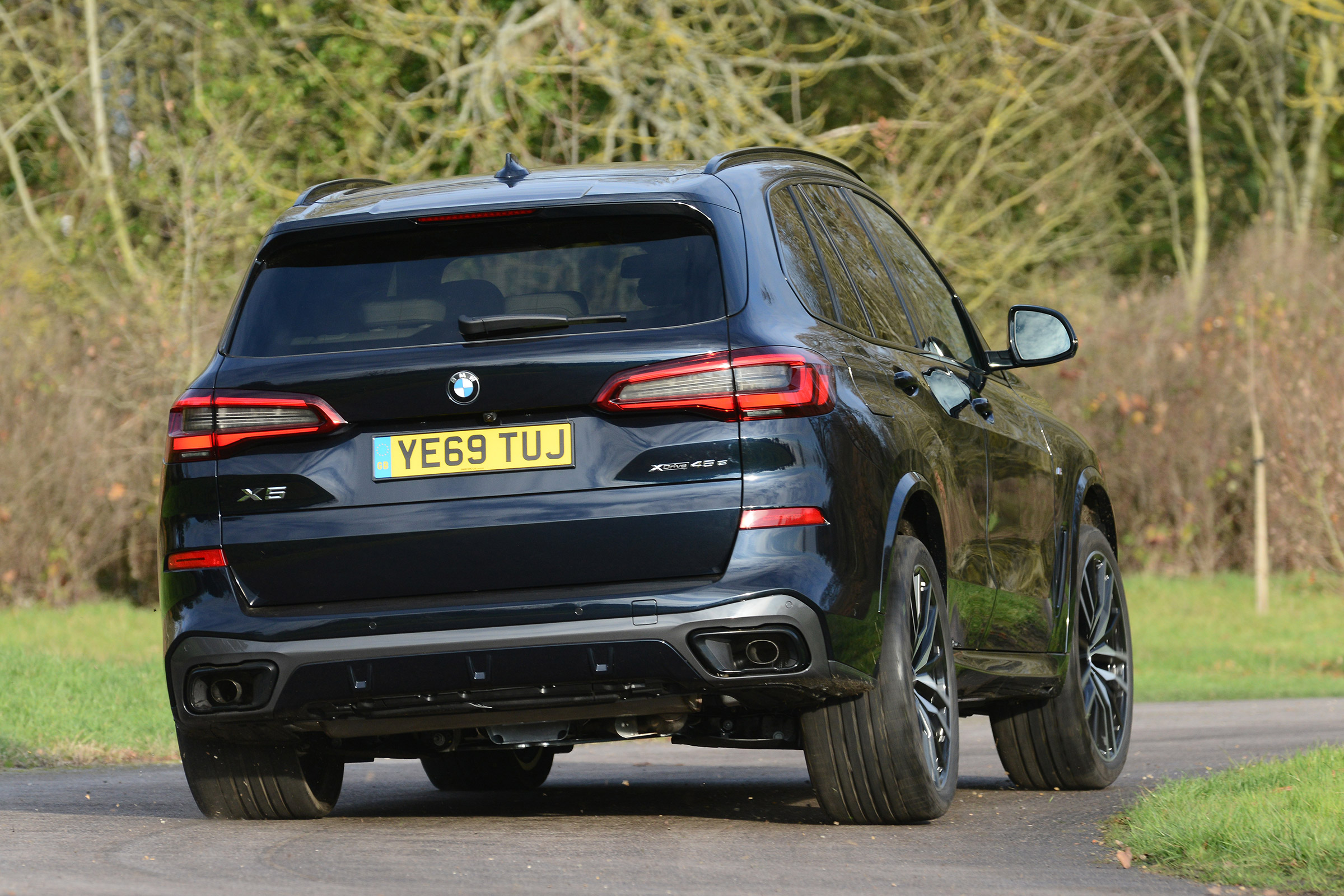 BMW X5 xDrive45e SUV rear cornering