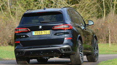 BMW X5 xDrive45e SUV rear cornering