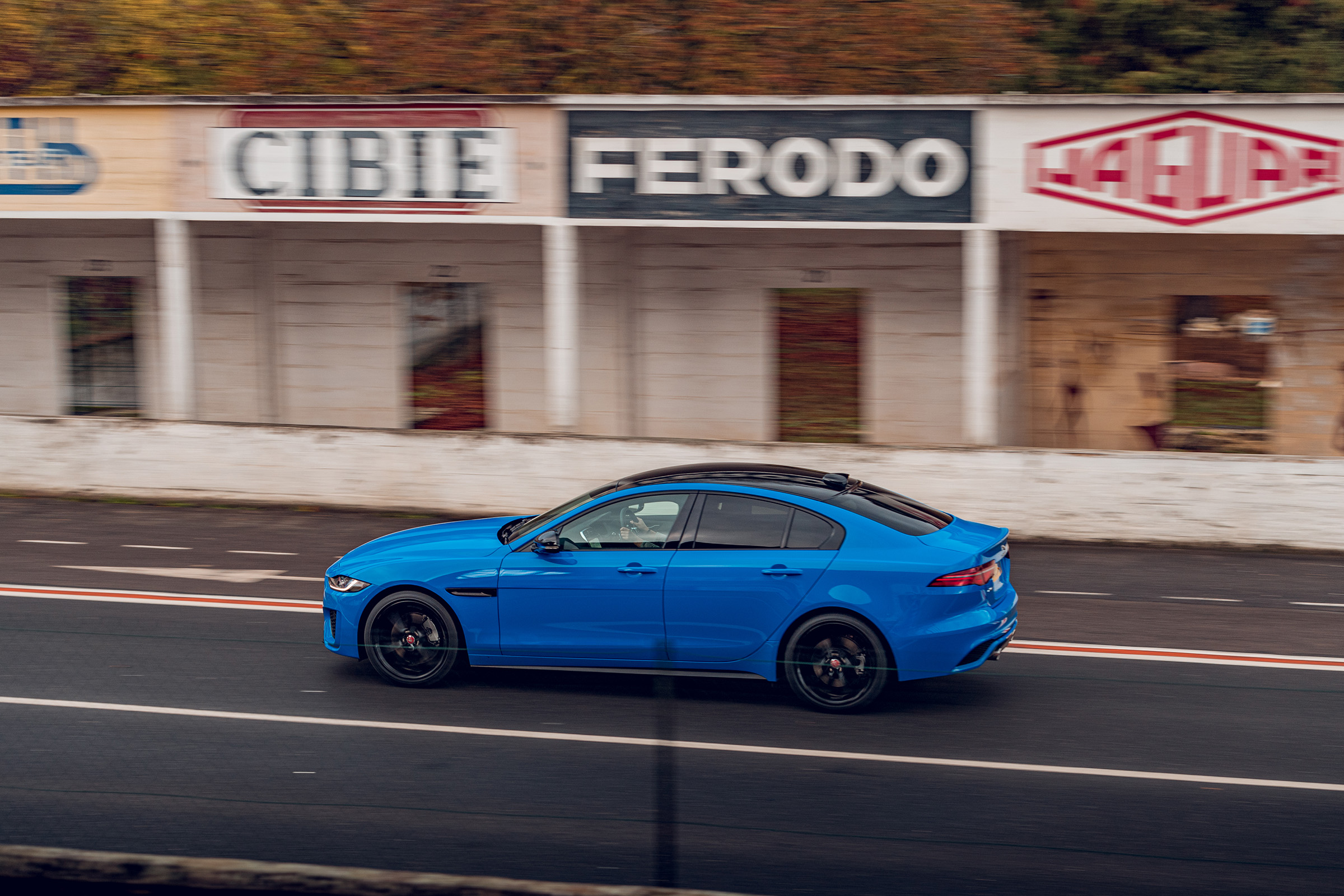 Jaguar XE Reims Edition driving - side view