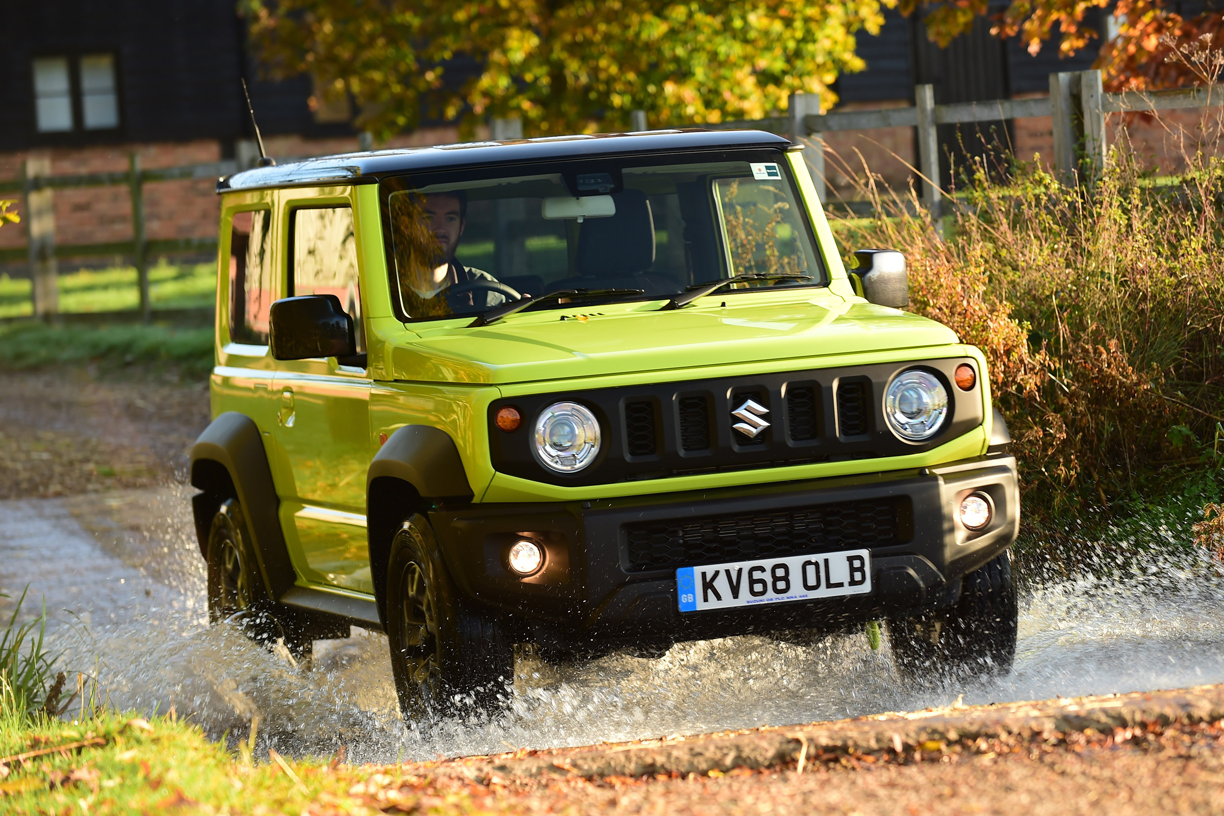 Suzuki Jimny SUV water splash