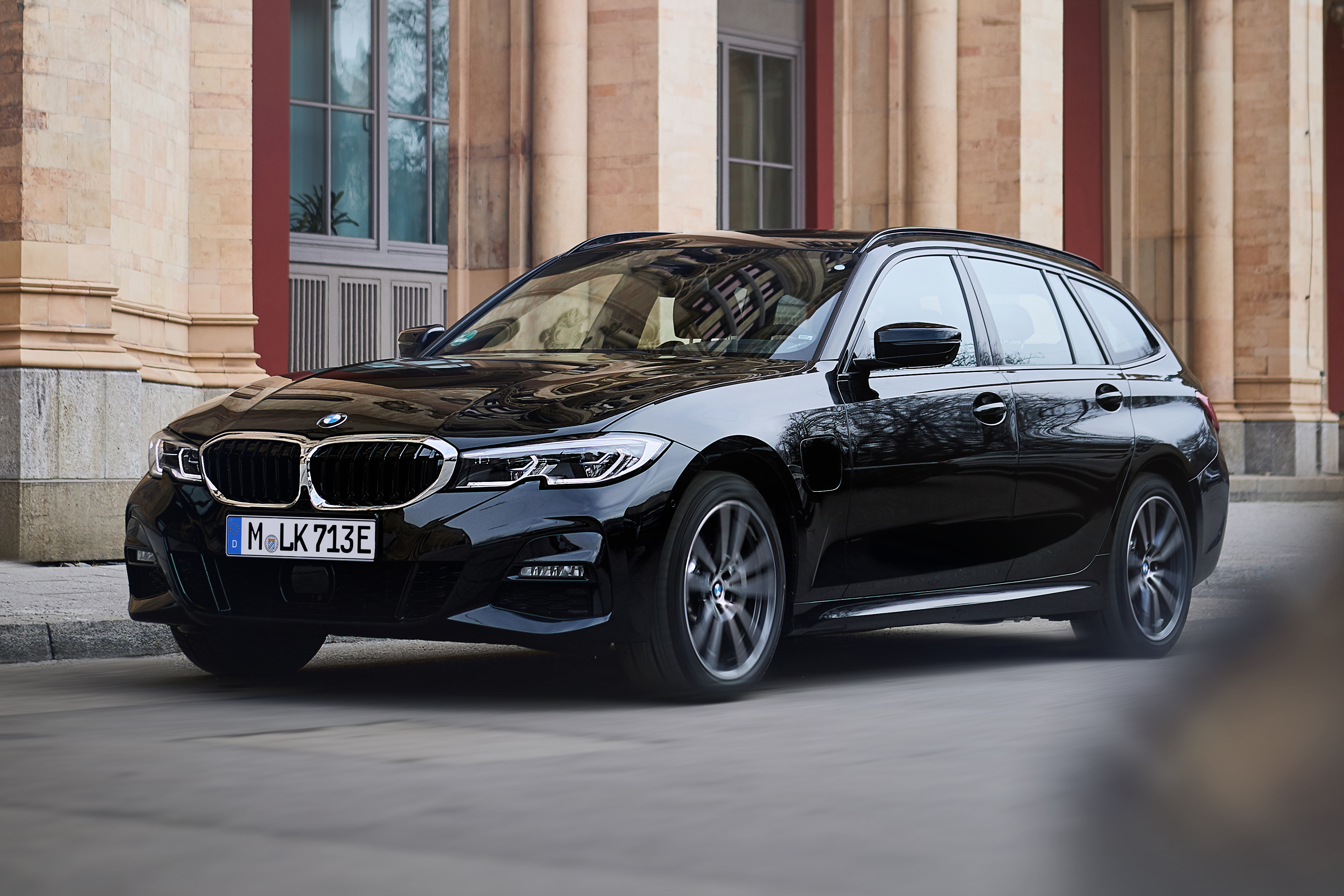 2020 BMW 330e Touring - front 3/4 view