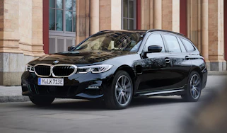 2020 BMW 330e Touring - front 3/4 view