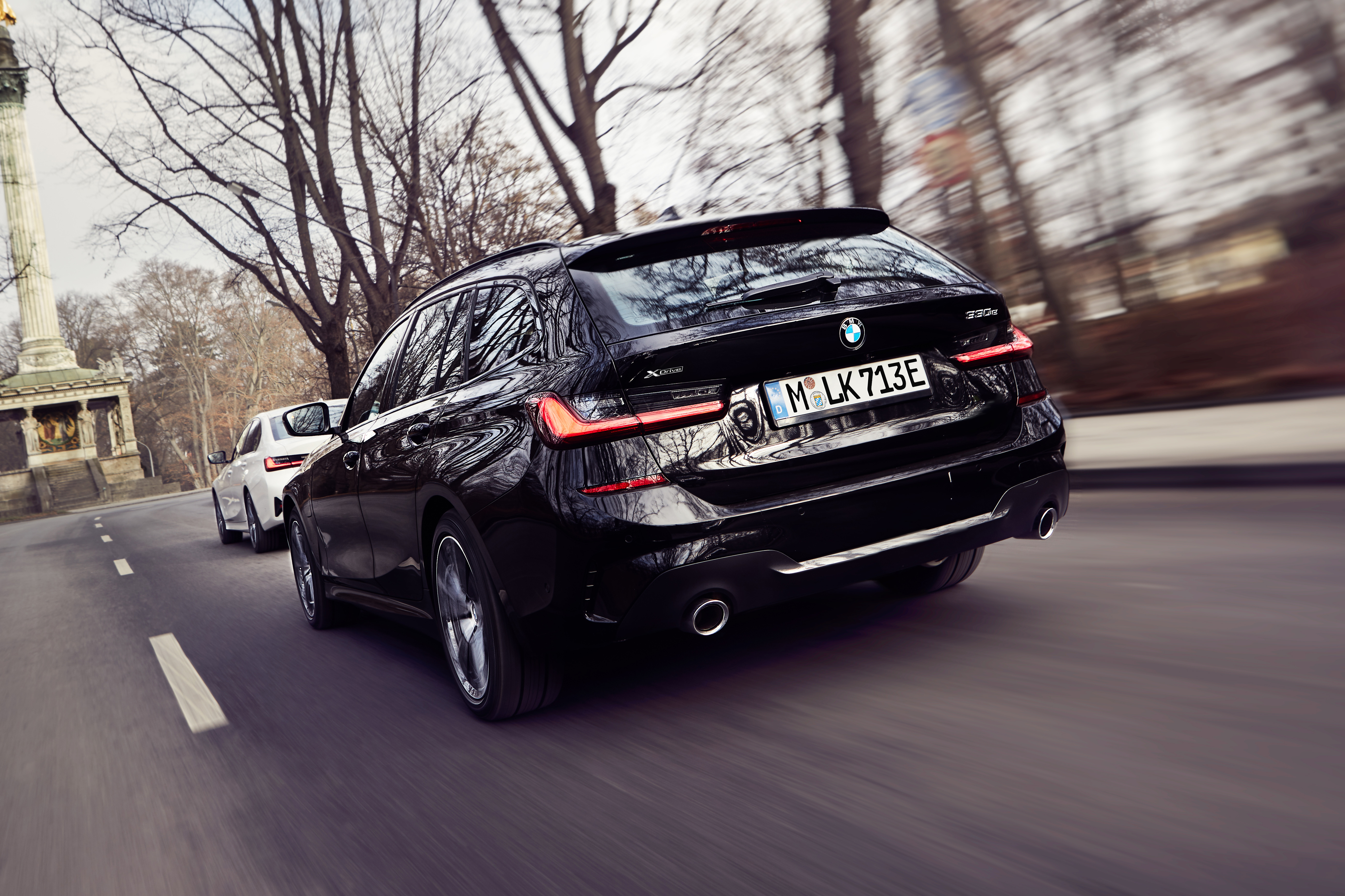 2020 BMW 330e Touring - rear 3/4 view dynamic