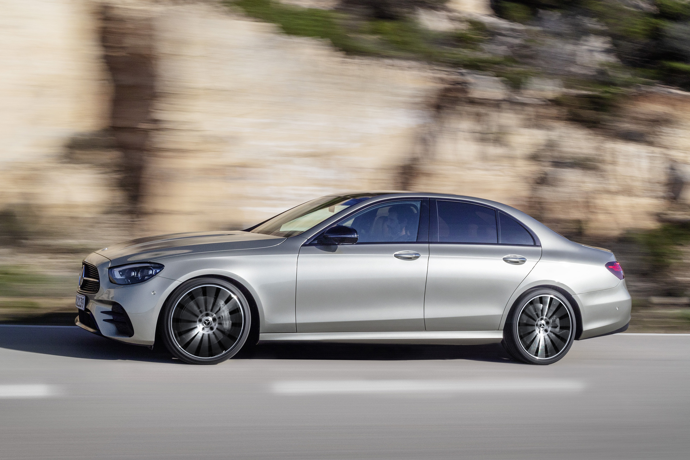 Mercedes E-Class driving - side view