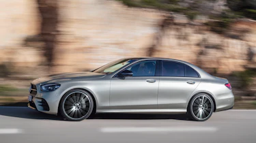 Mercedes E-Class driving - side view