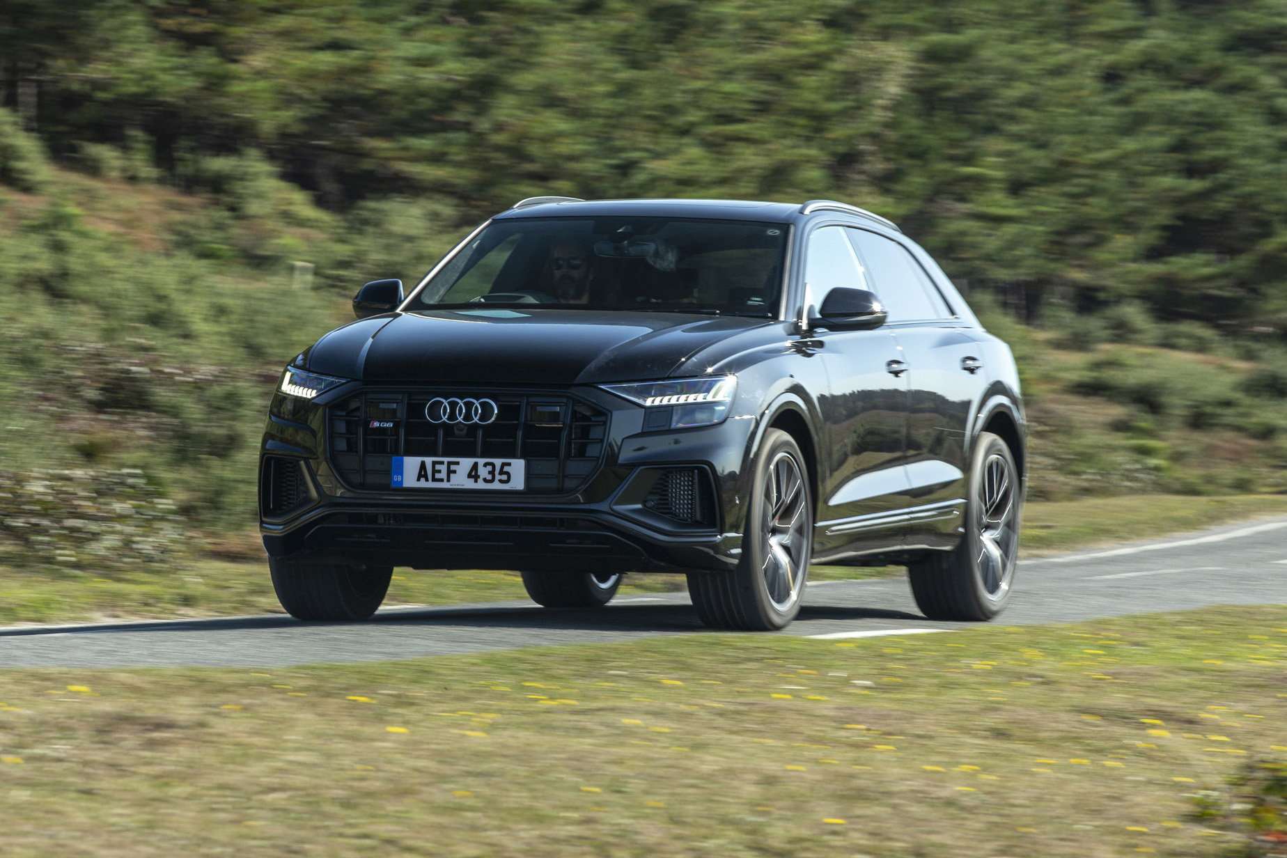 Audi SQ8 - front 3/4 view passing 