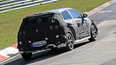 Hyundai i20 N development car - rear 3/4 view passing