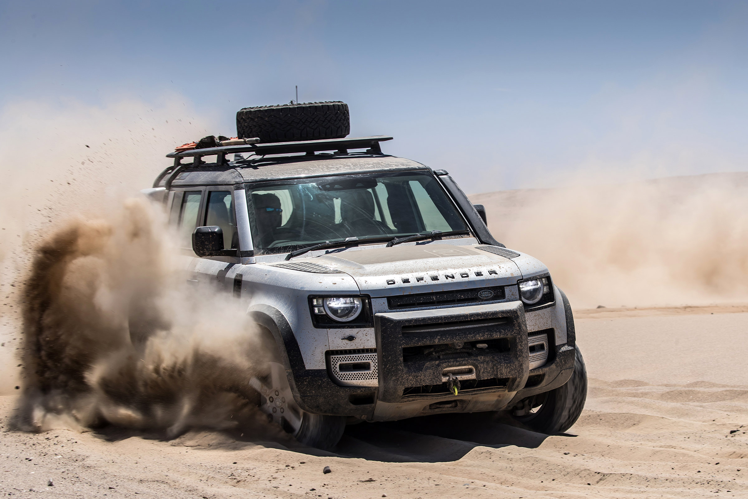 Land Rover Defender SUV off-road sand