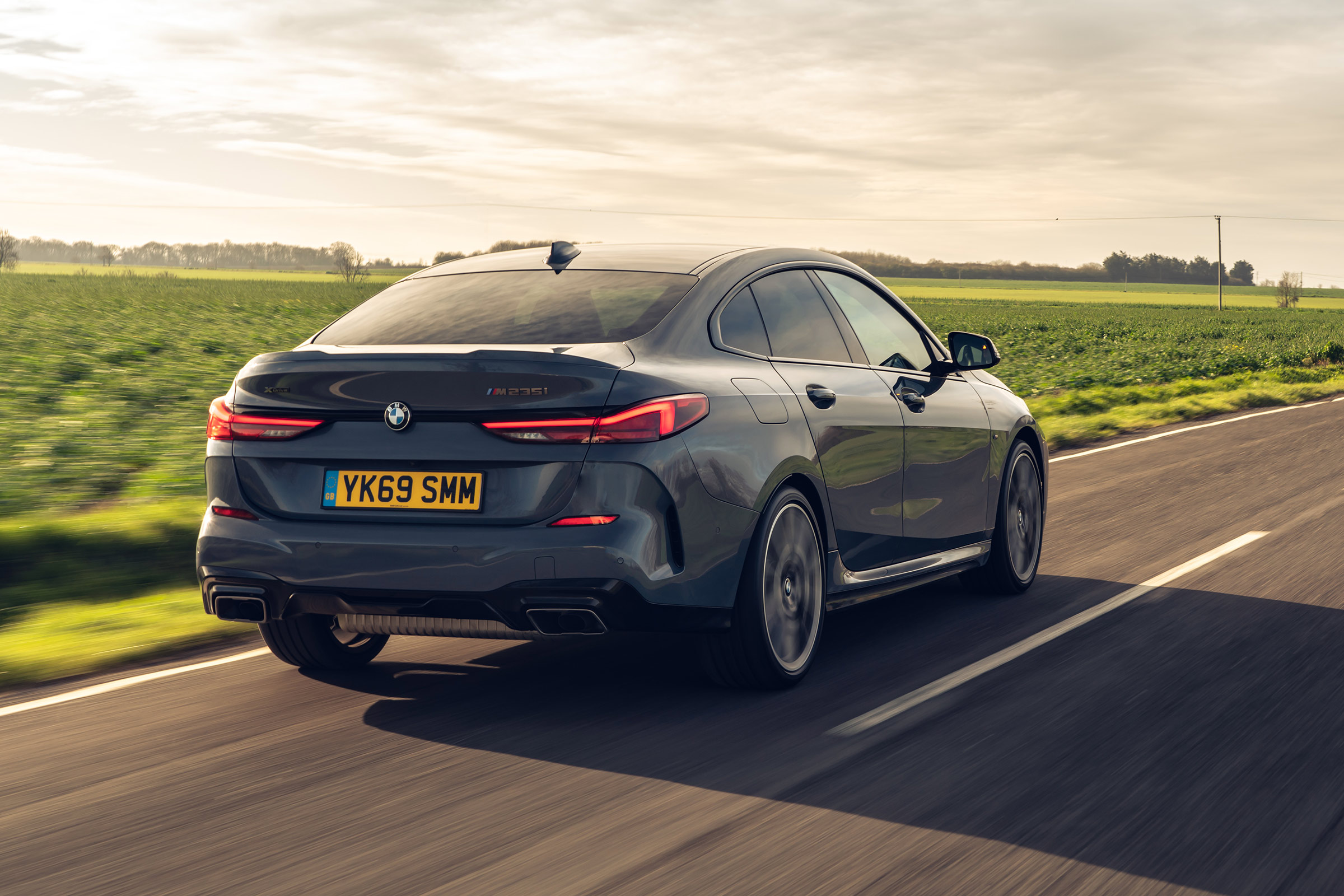 BMW M235i Gran Coupe saloon rear 3/4 tracking