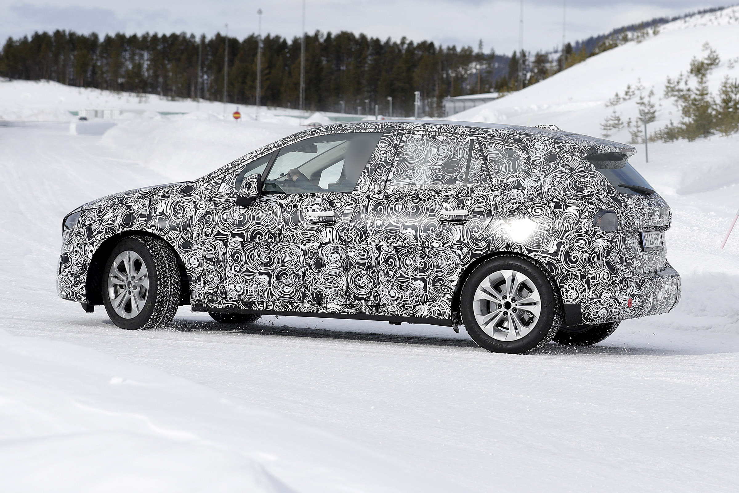 BMW 2 Series Active Tourer in camouflage - side view