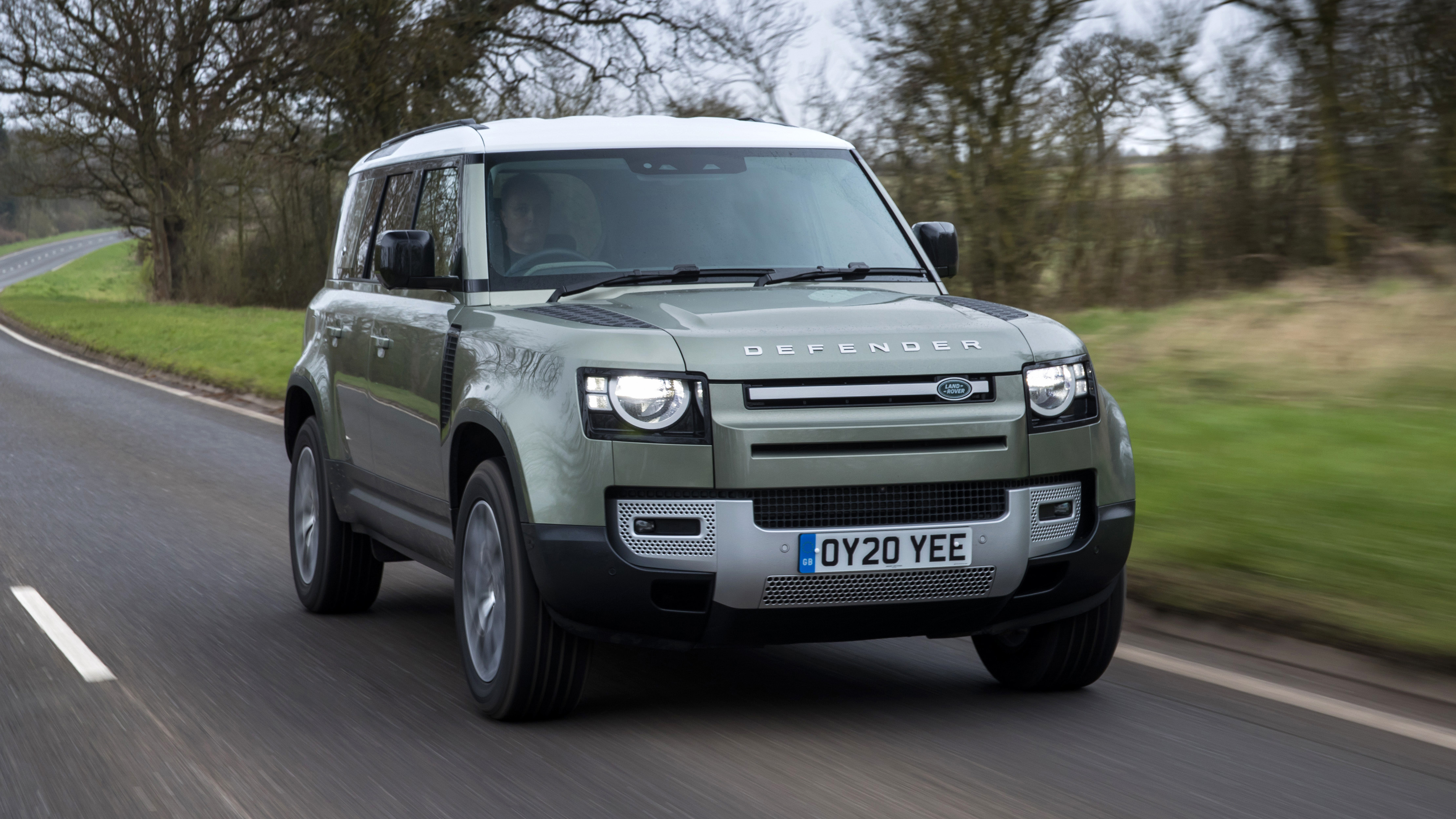 Land Rover Defender 110 - front 3/4 driving 