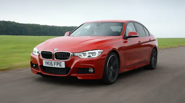 BMW 330e - front 3/4 driving