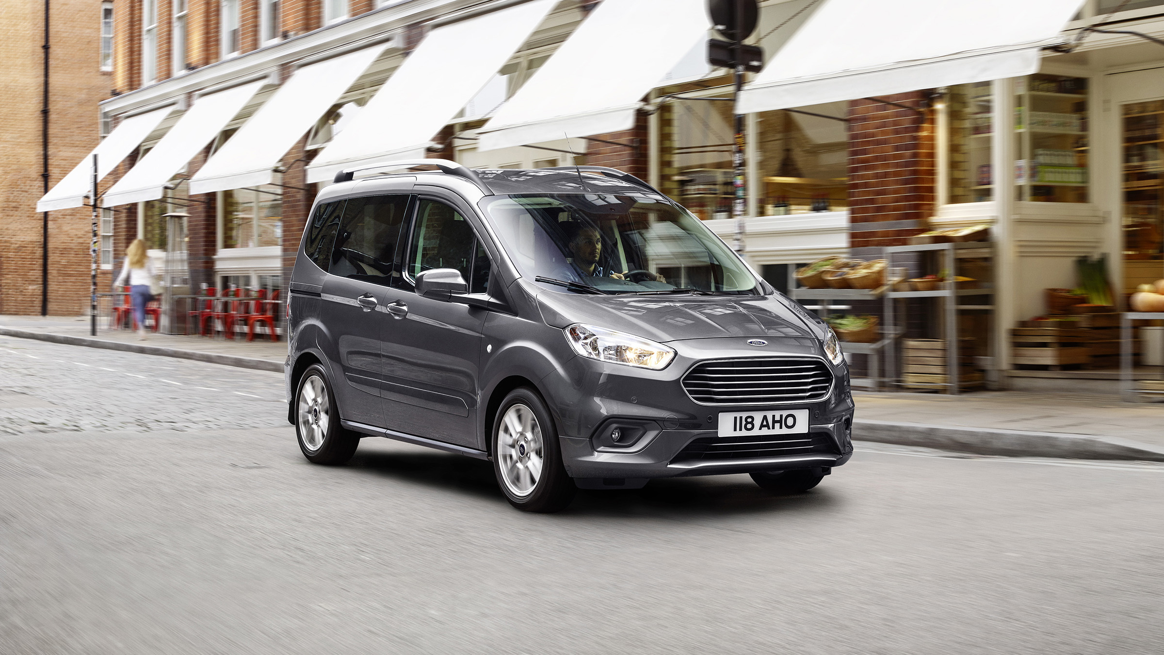 Ford Tourneo Courier driving in town