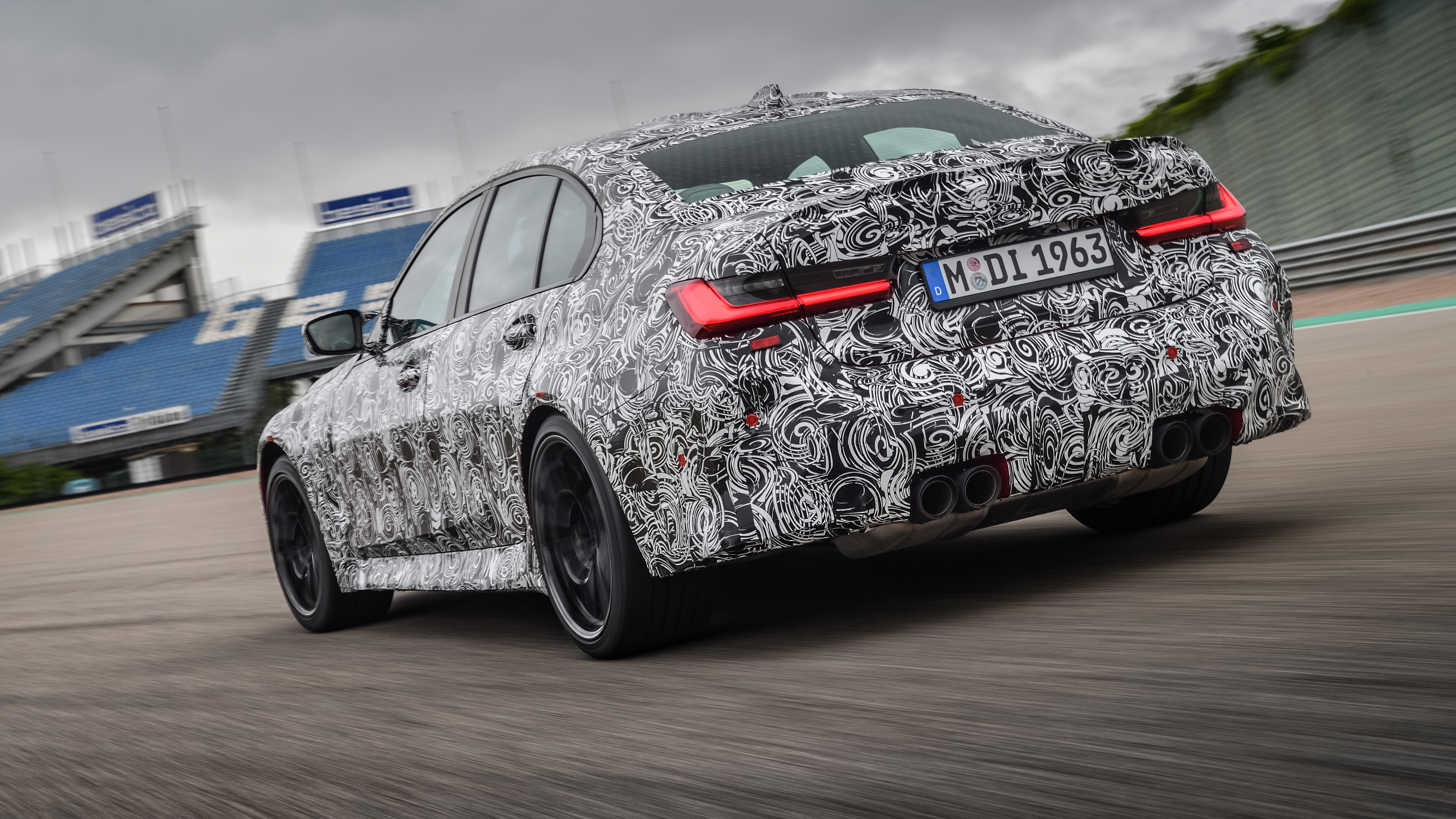 2020 BMW M3 saloon prototype - rear 3/4 view