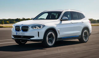 BMW iX3 driving