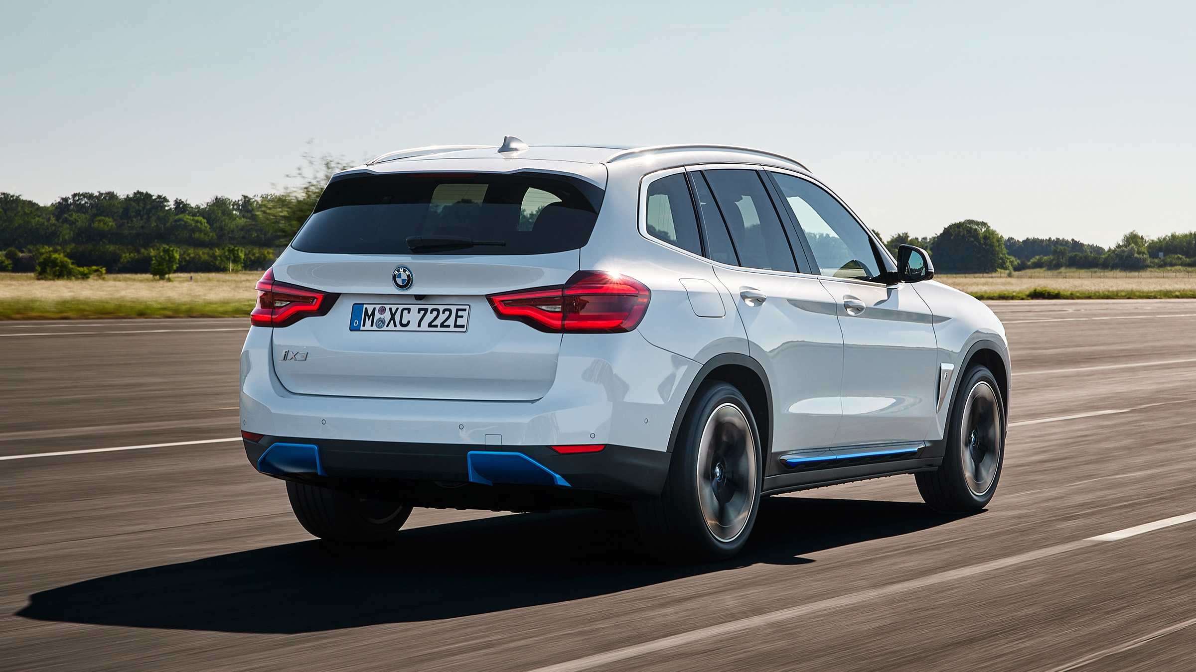 BMW iX3 driving - rear