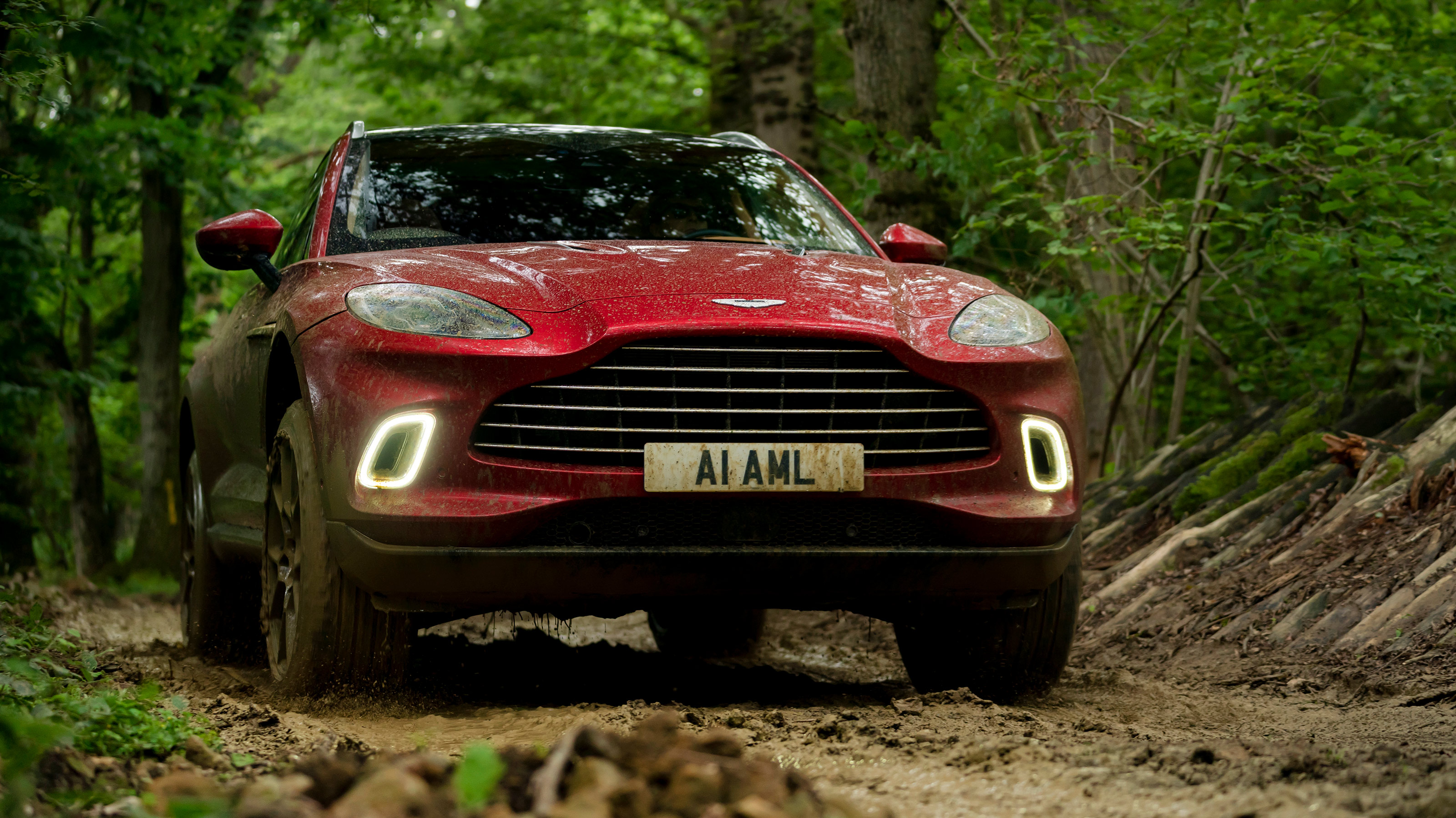 Aston Martin DBX SUV off-road mud front