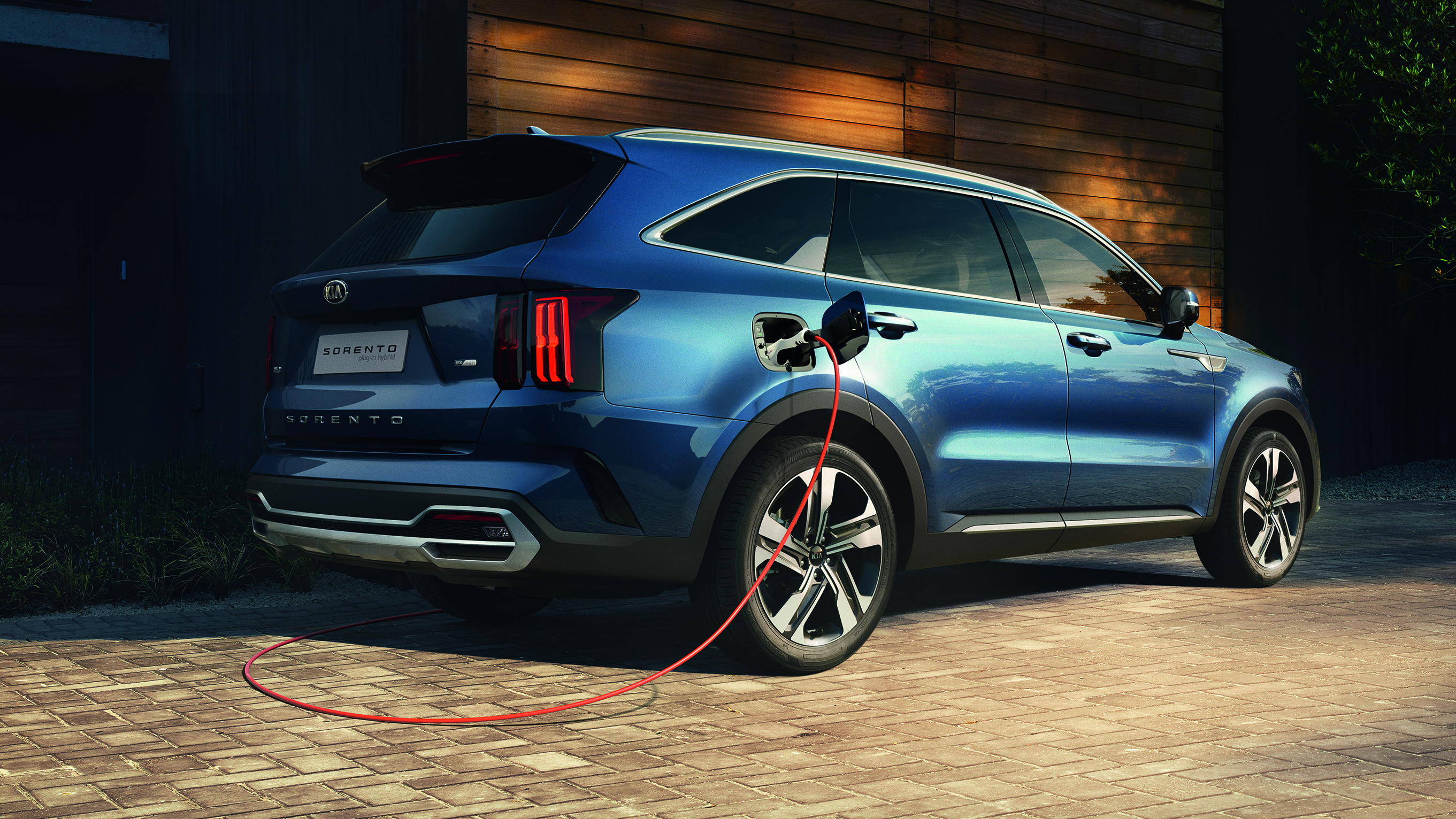 2020 Kia Sorento SUV plug-in hybrid - rear 3/4 static charging 