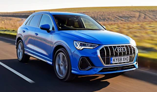 Audi Q3 SUV front 3/4 tracking