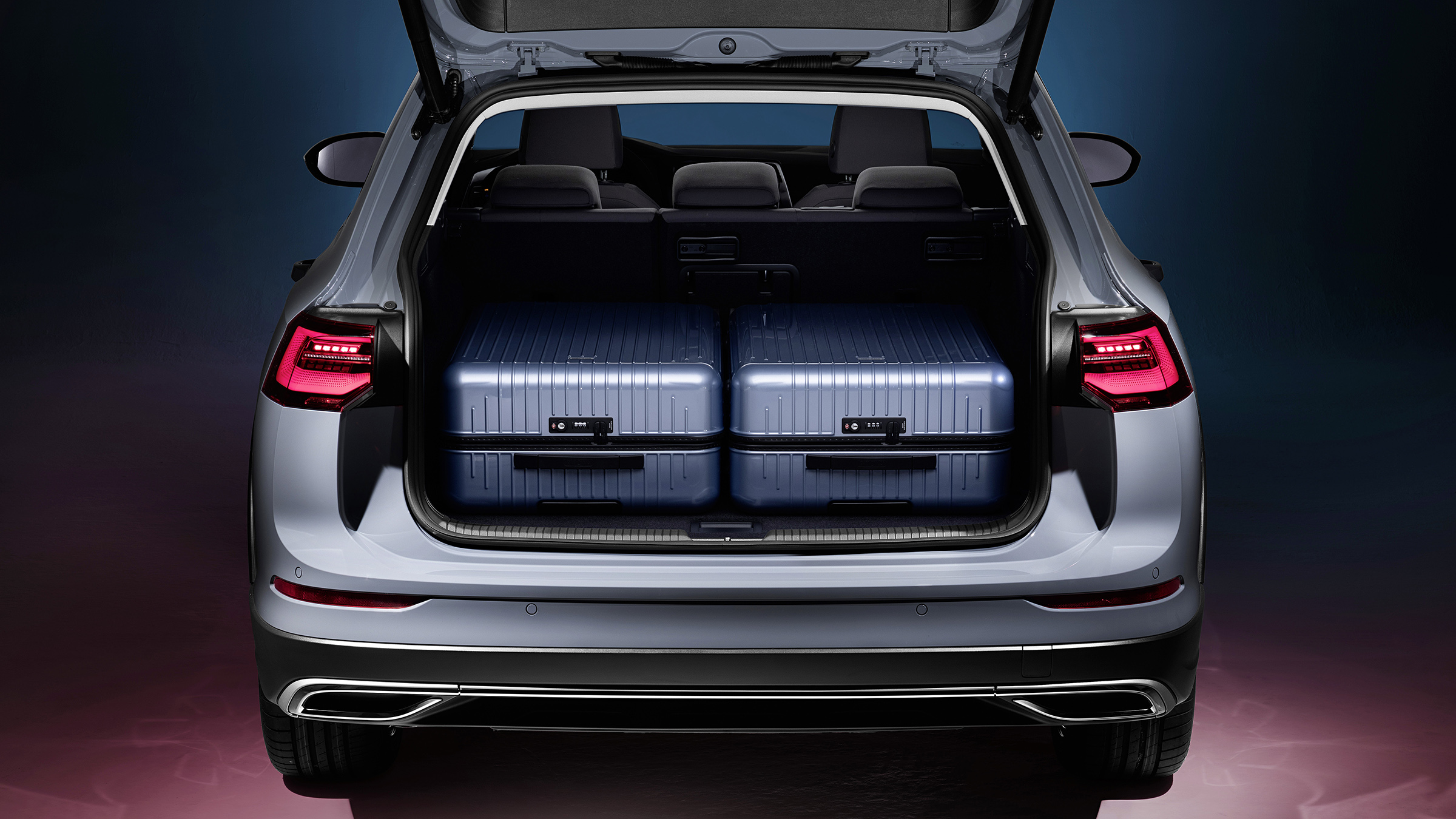 2020 Volkswagen Golf Estate Alltrack boot with two large suitcases