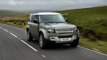 2020 Land Rover Defender 110 P400e plug-in hybrid - front 3/4 view on road
