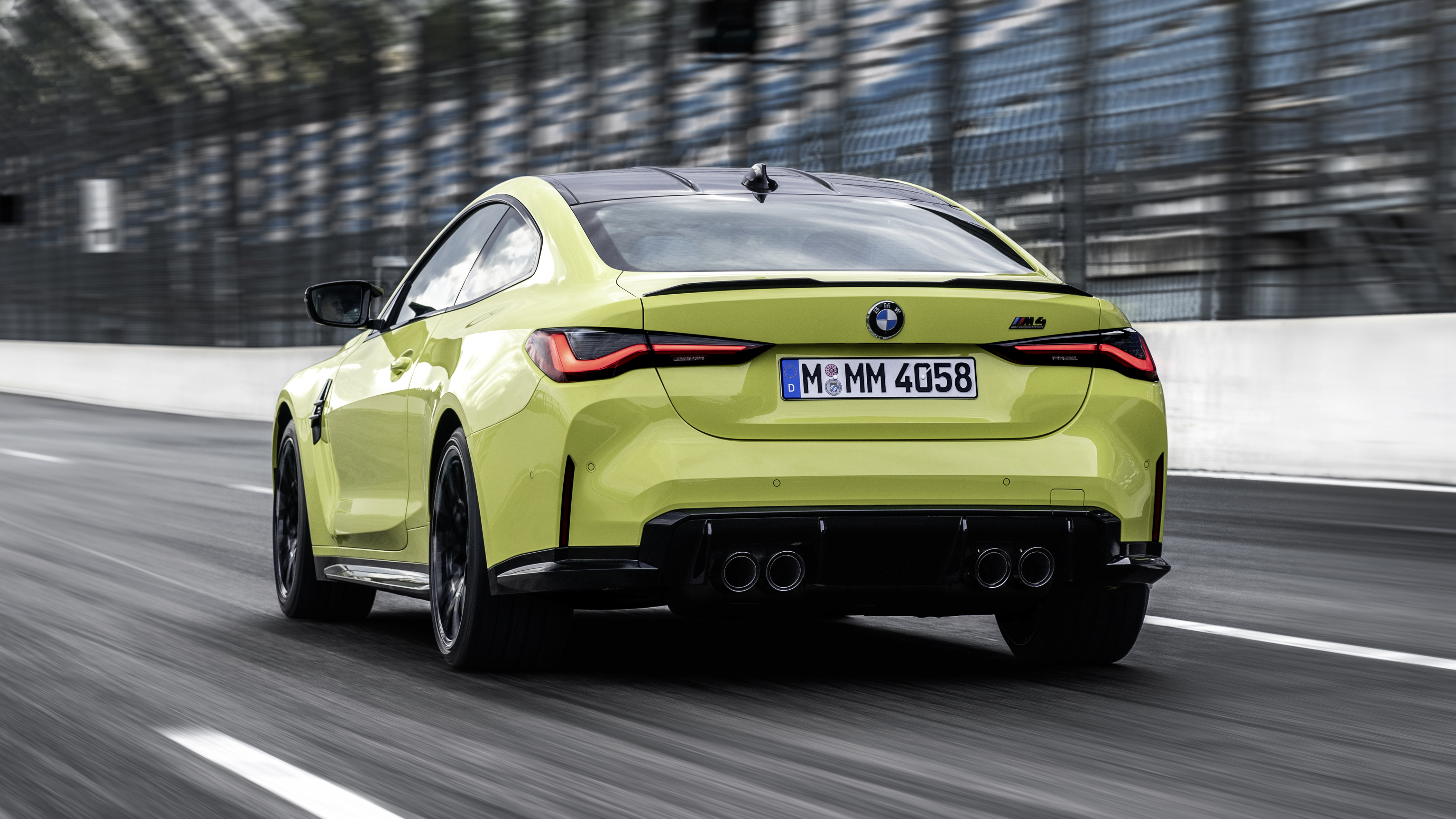 2021 BMW M4 Competition Coupe - rear view dynamic 