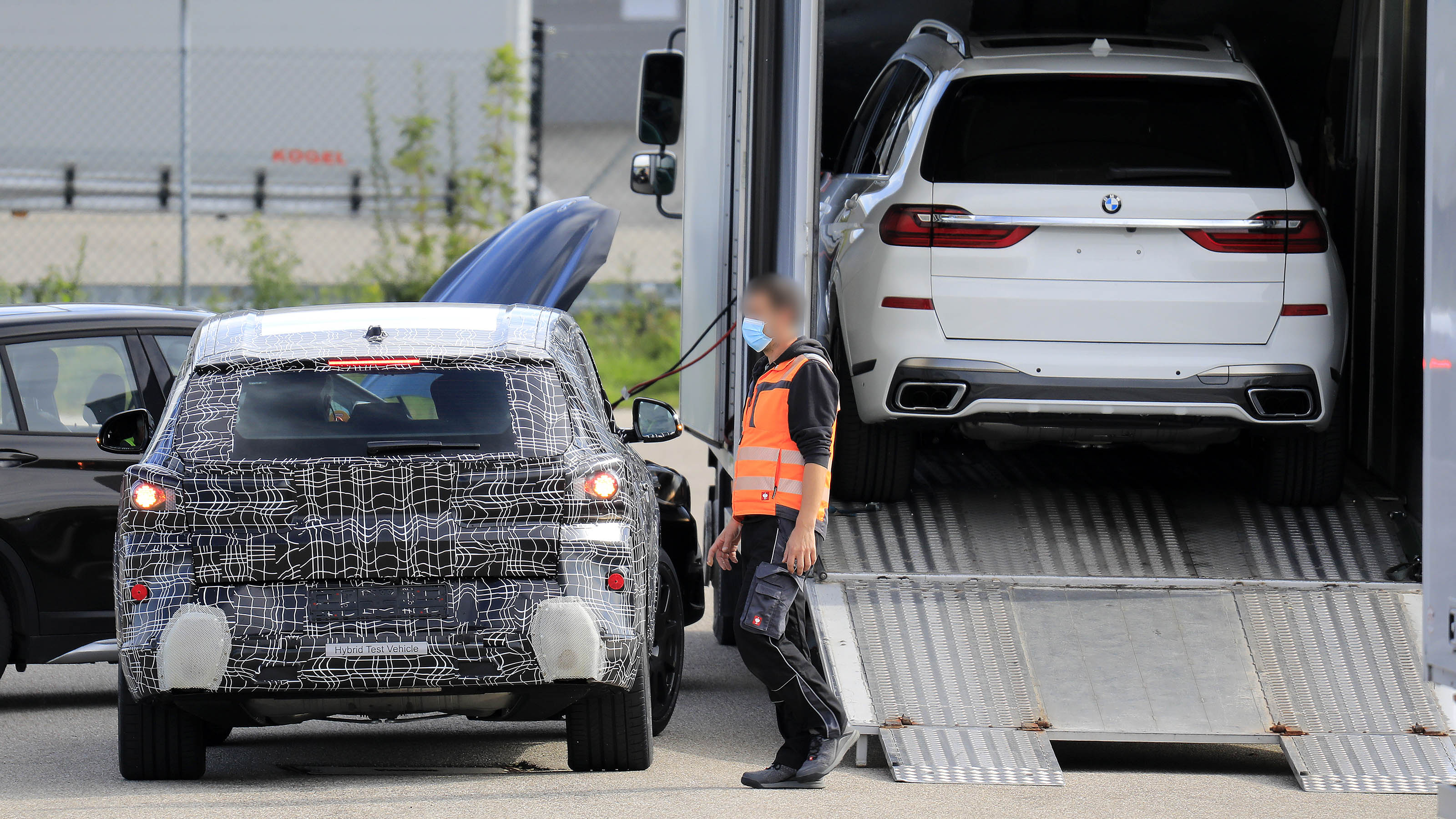 BMW X8 SUV prototype next to X7