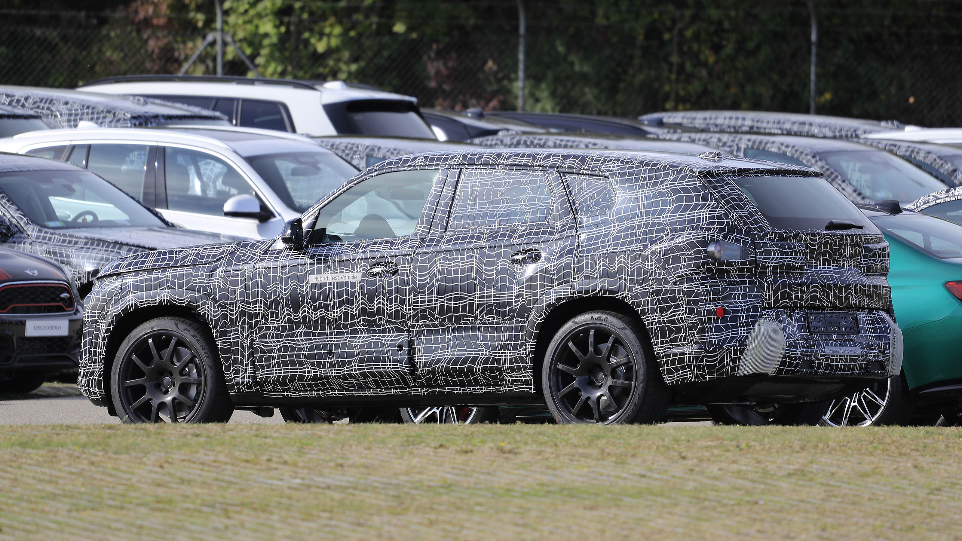 BMW X8 SUV prototype - side/rear view