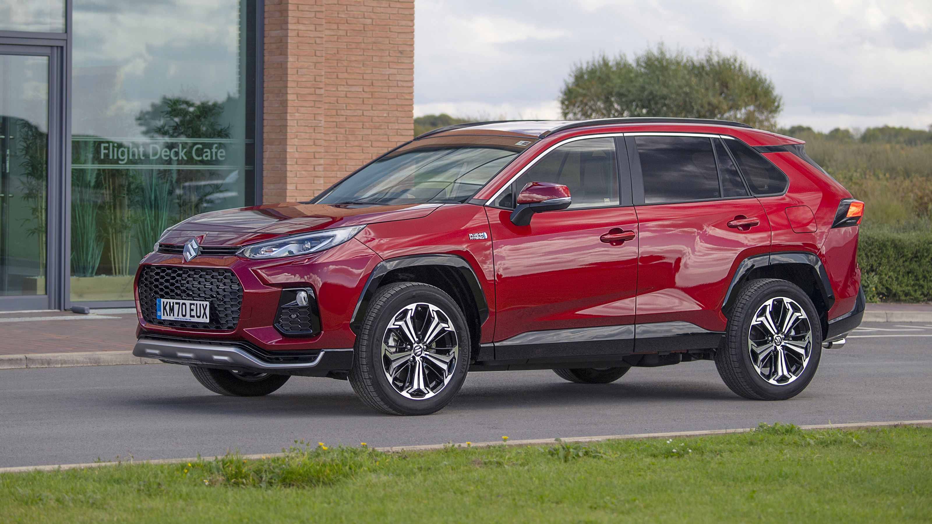 Suzuki Across SUV side static