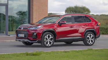 Suzuki Across SUV side static