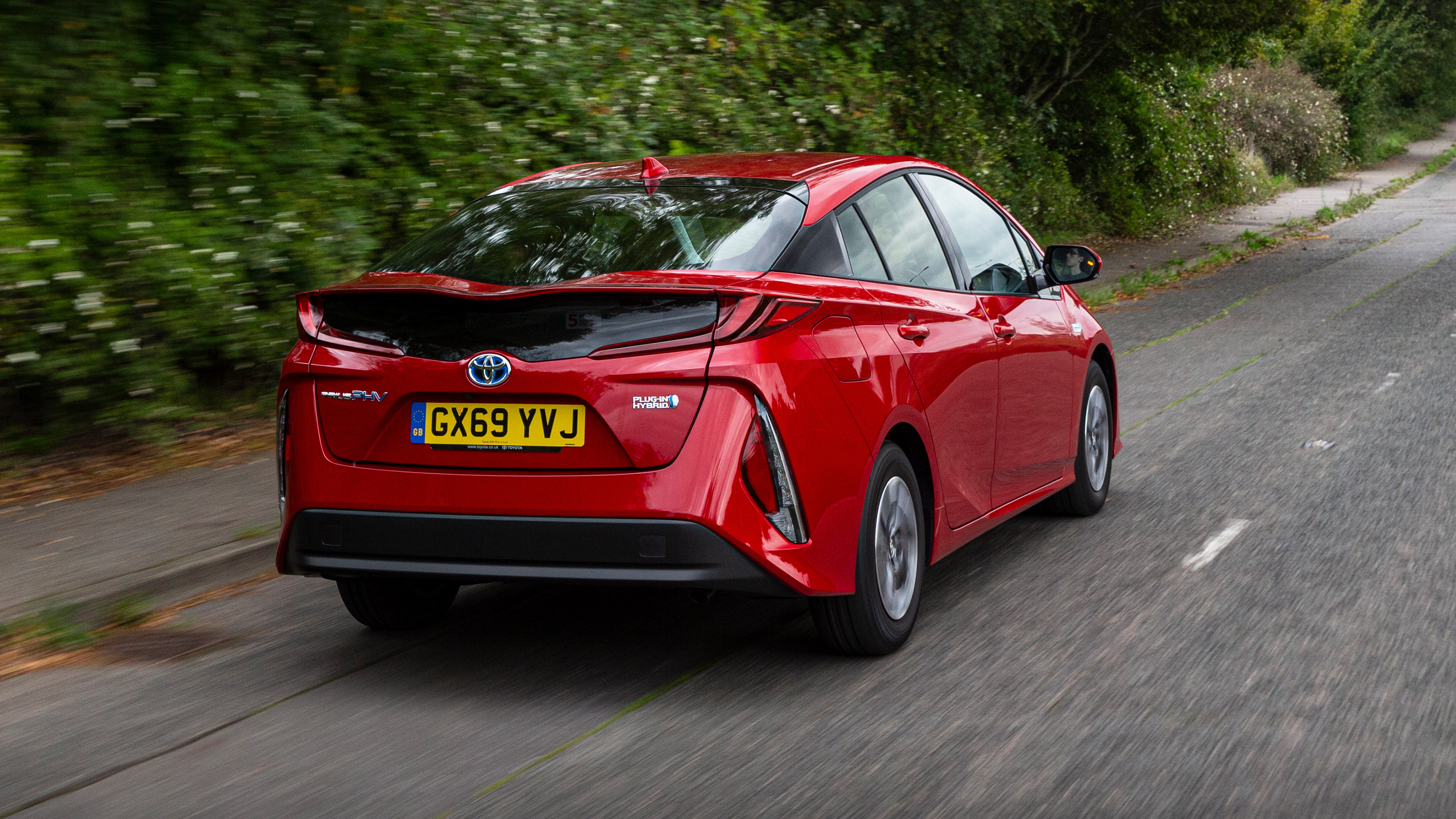 Toyota Prius Plug-in Hybrid hatchback rear 3/4 tracking