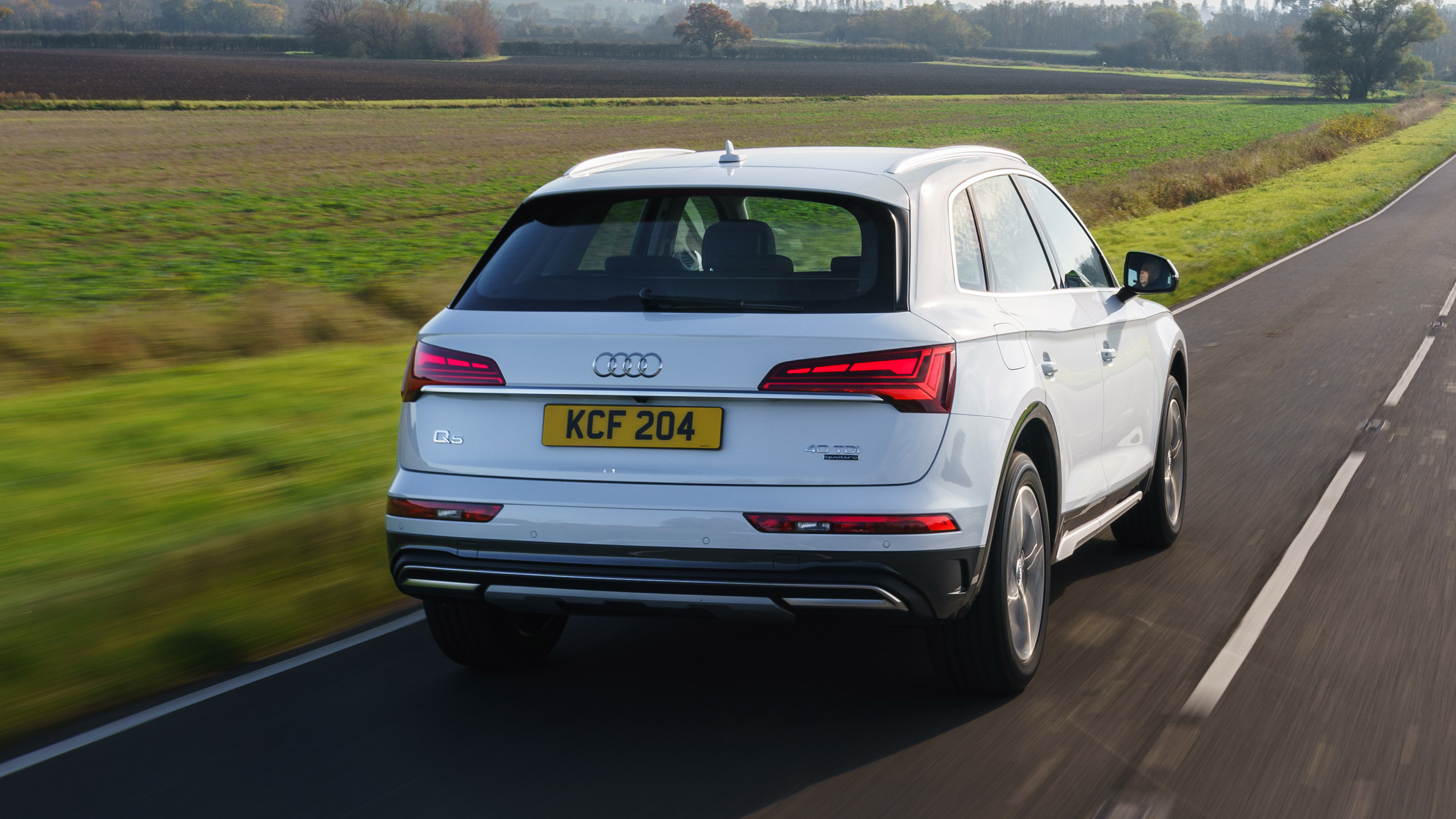 Audi Q5 driving - rear