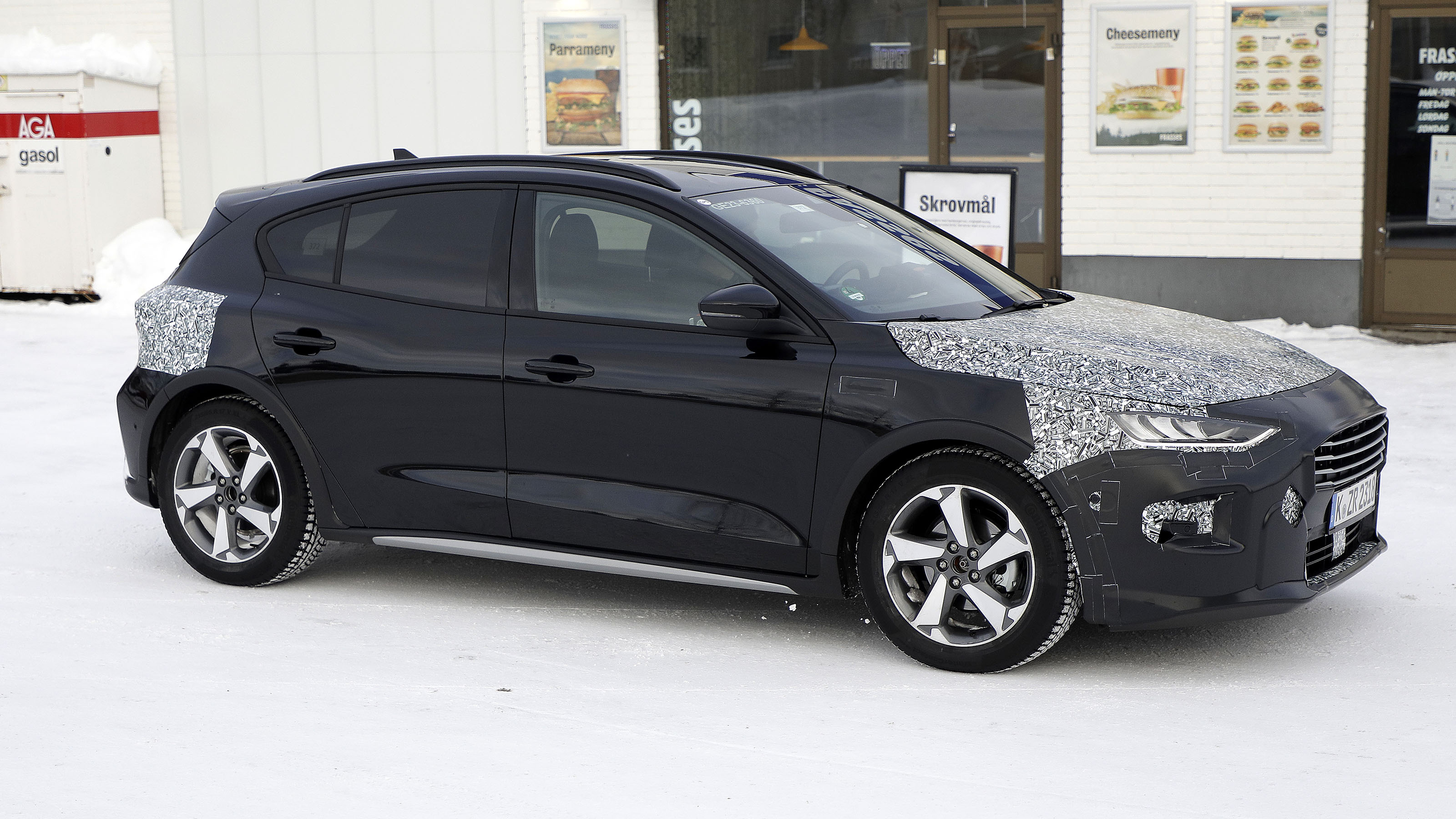2021 Ford Focus in camouflage - side view