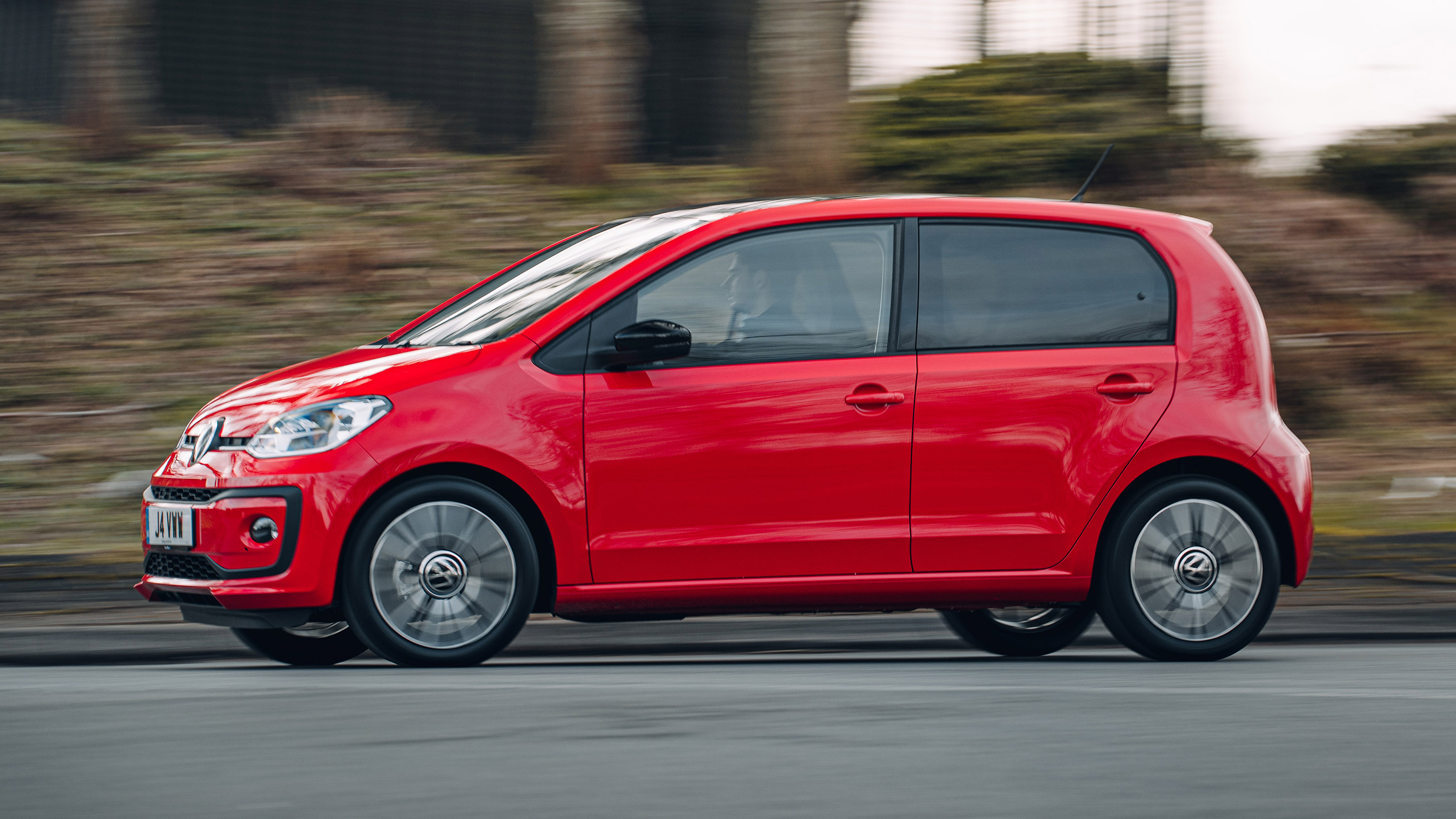 Volkswagen up! hatchback driving - side view