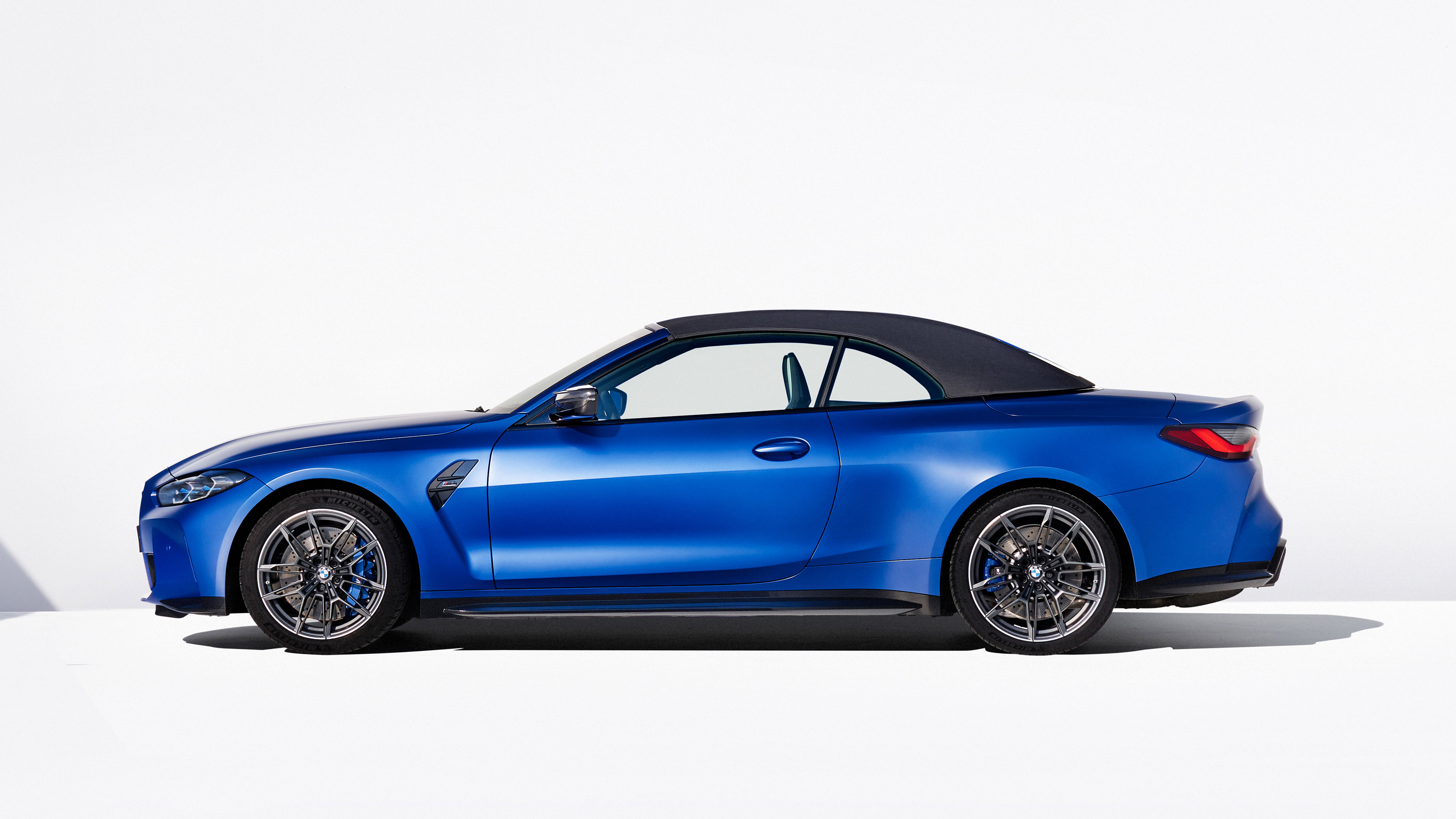 2021 BMW M4 Competition Convertible M xDrive -  side view roof up