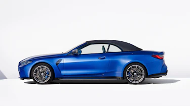 2021 BMW M4 Competition Convertible M xDrive - side view roof up